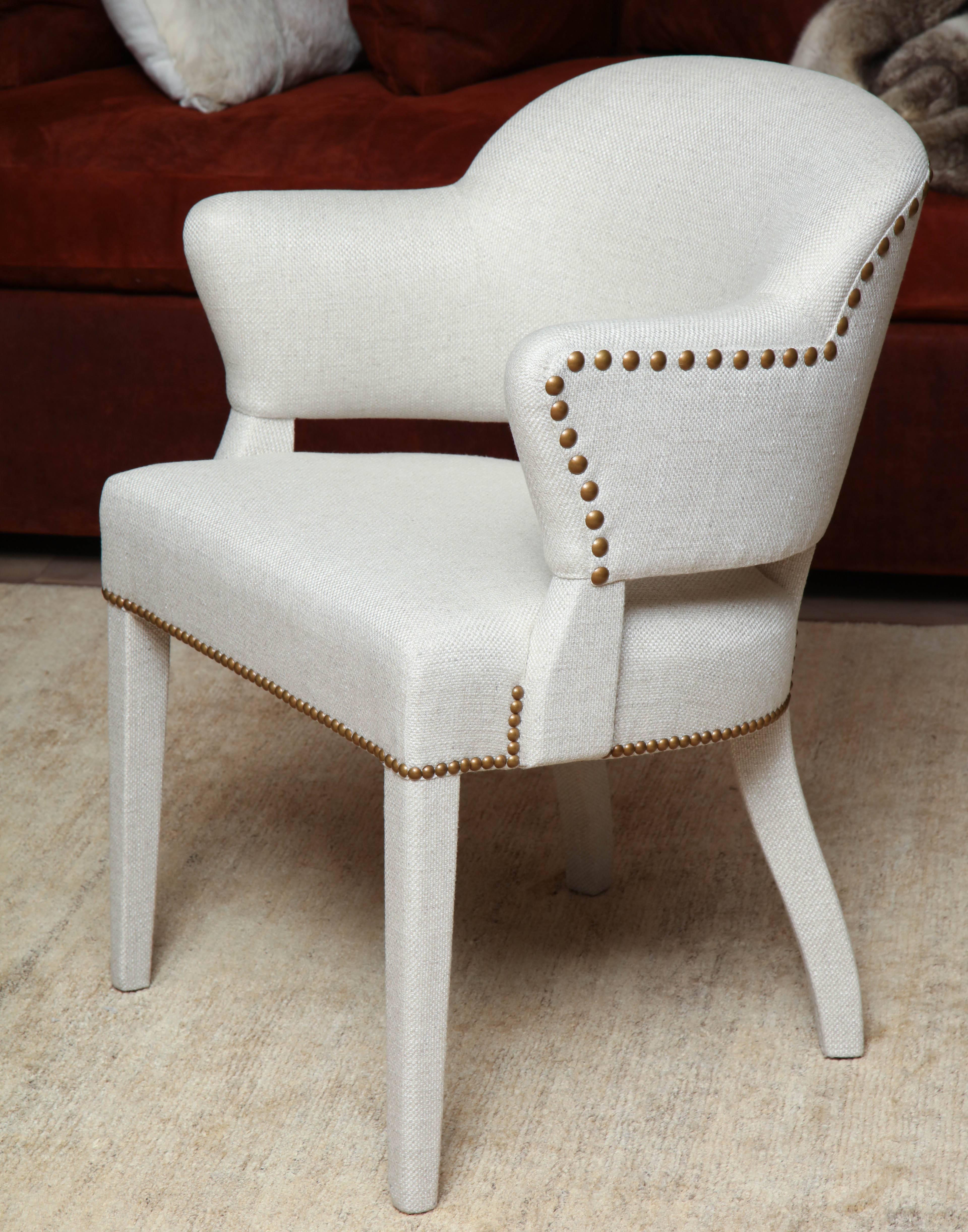 Pair of 1940s barrel back chairs fully clad and upholstered in an ivory basketweave linen with nailhead trim, several other sets available.