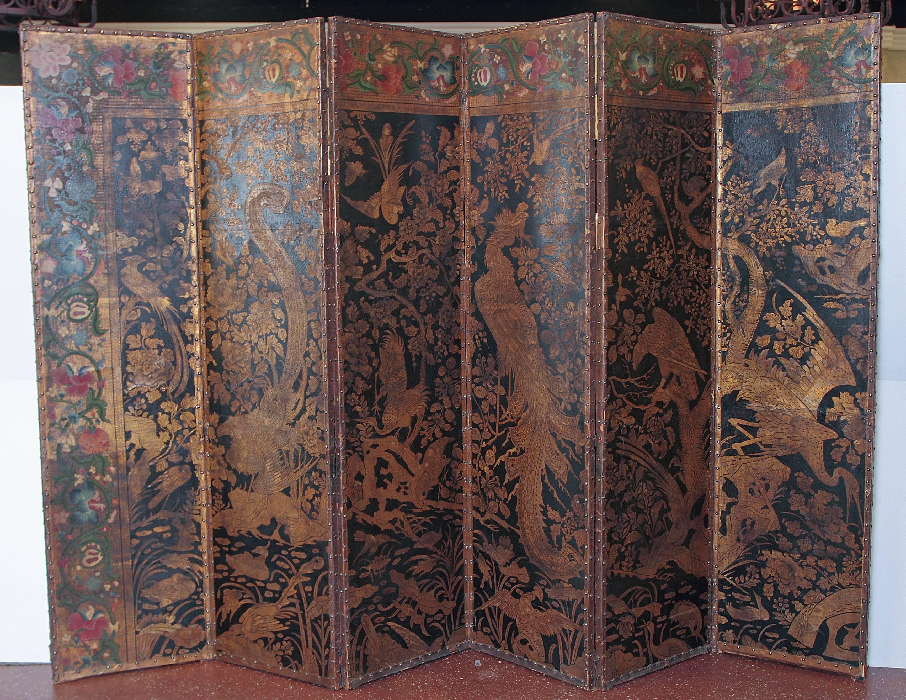 chinoiserie six-panel embossed and painted leather floor screen.