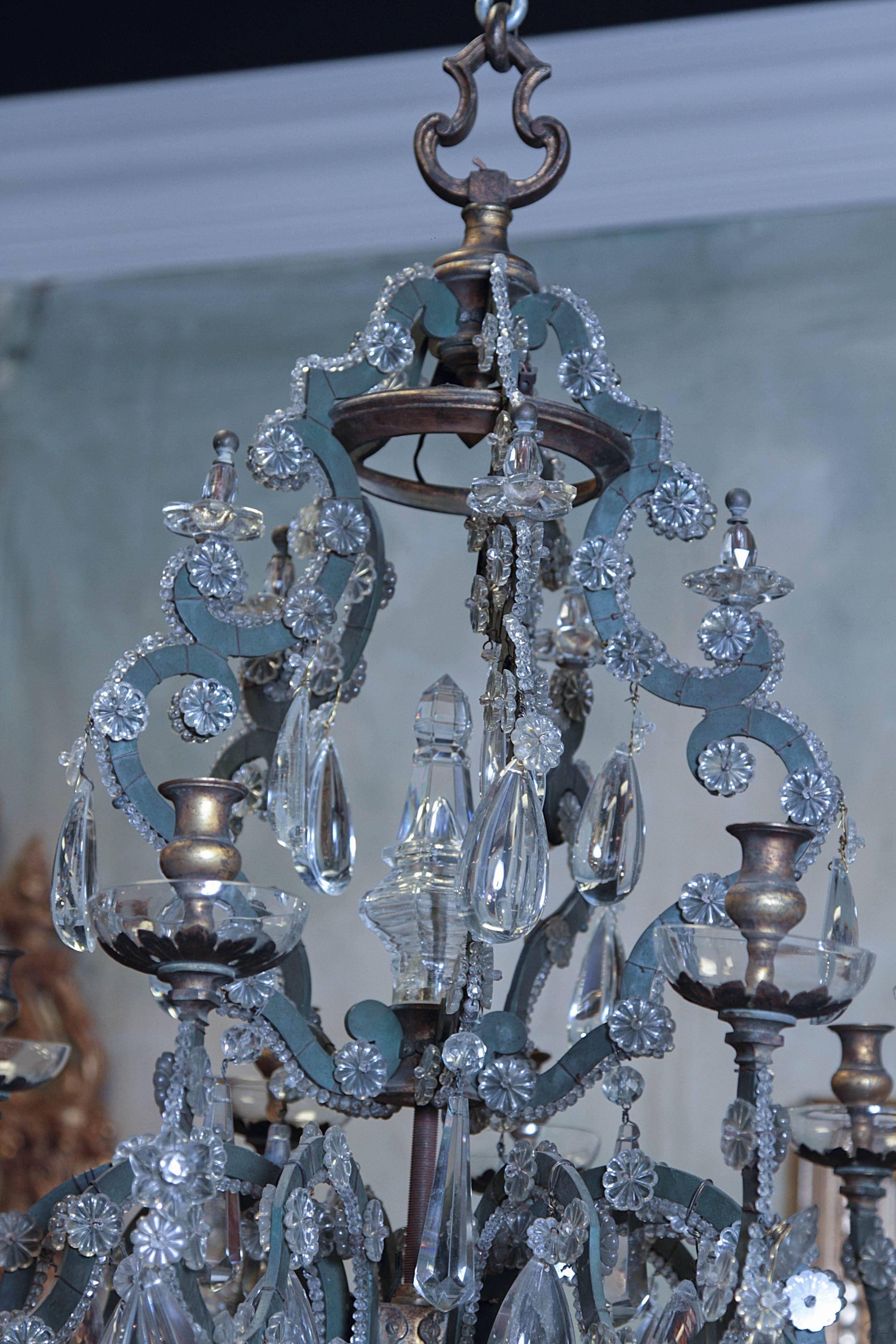 Late 19th century Italian chandelier on verde iron frame. Crystal beading and crystal drops.