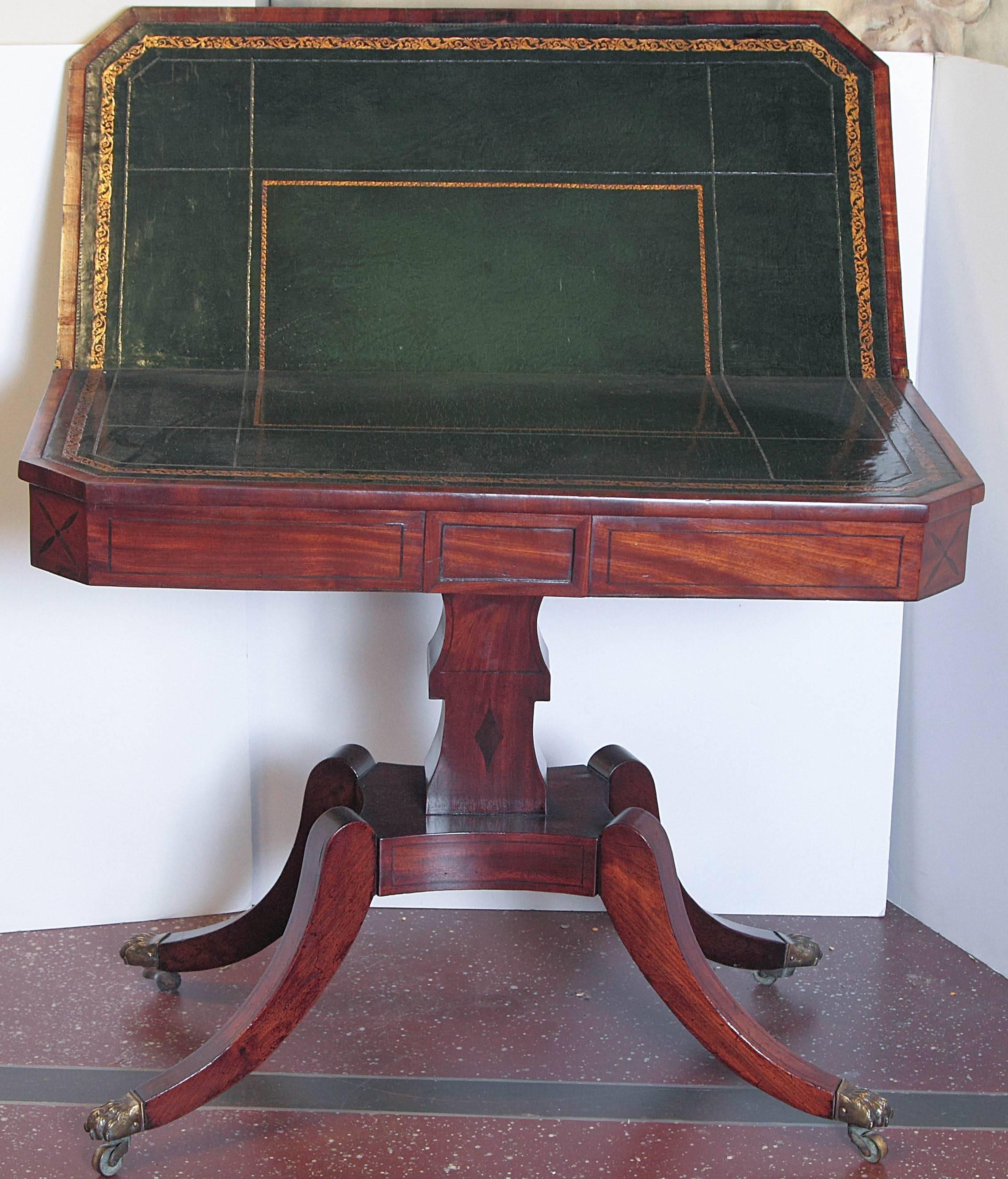 Period English Regency mahogany flip-top games table.