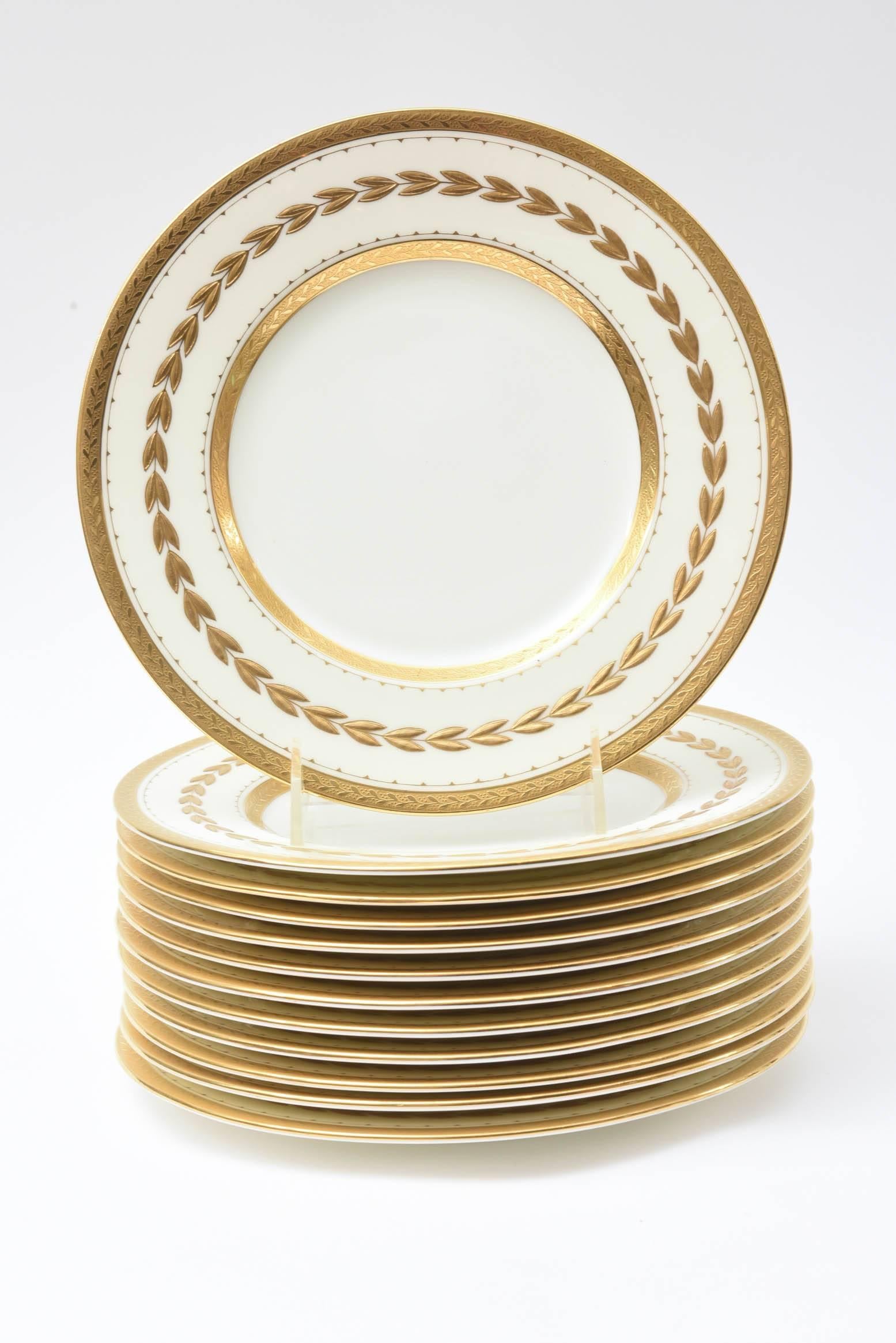 A classic and crisp set of 12 plate’s custom ordered through the fine Gilded Age Retailer: Tiffany & Co, New York. Manufactured by the storied English porcelain firm of Minton. A thick heavy raised paste design on the collar of the plates and