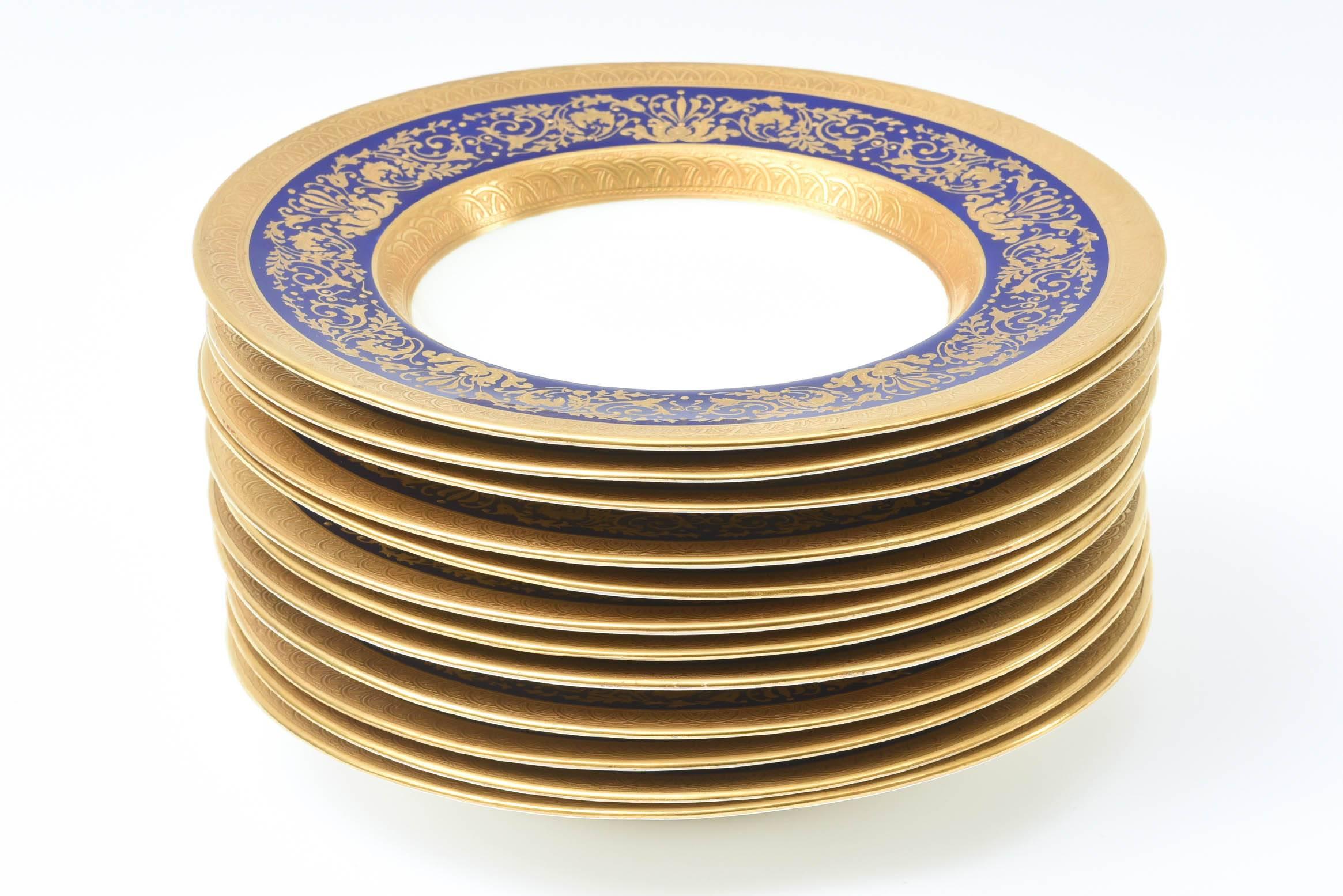 A lovely set of 12 custom for Tiffany by one of England's premier firms: Minton. Raised tooled gilding on a vibrant and elegant cobalt blue collar. The perfect size for soup, salad, risotto, first course and desserts with ice cream or sauce. We love