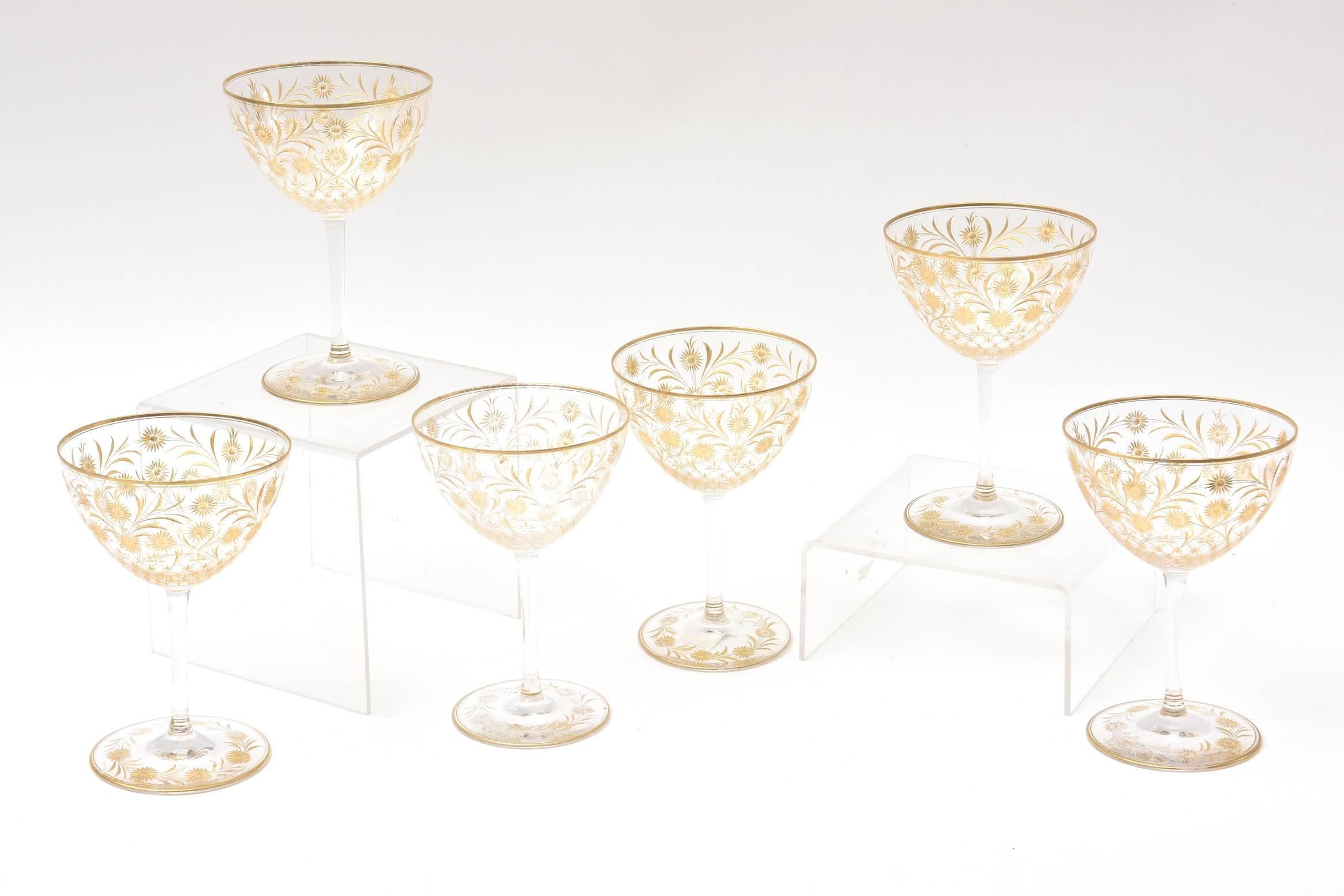We attribute these lovely and elegant wine glasses to the Moser Factory, last quarter of 19th century. Mouth blown, wheel cut and lavishly hand gilded. Perfect to mix and match in with all your fine crystal services. Lovely antique condition with no