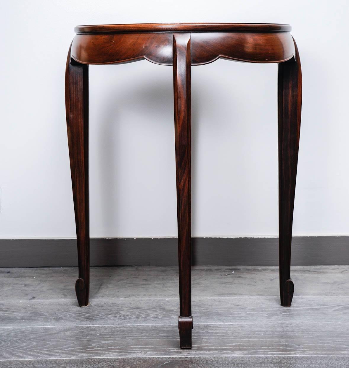 Elegant table or gueridon in rosewood.
By Sue et Mare, circa 1930
Similar table in the book 
