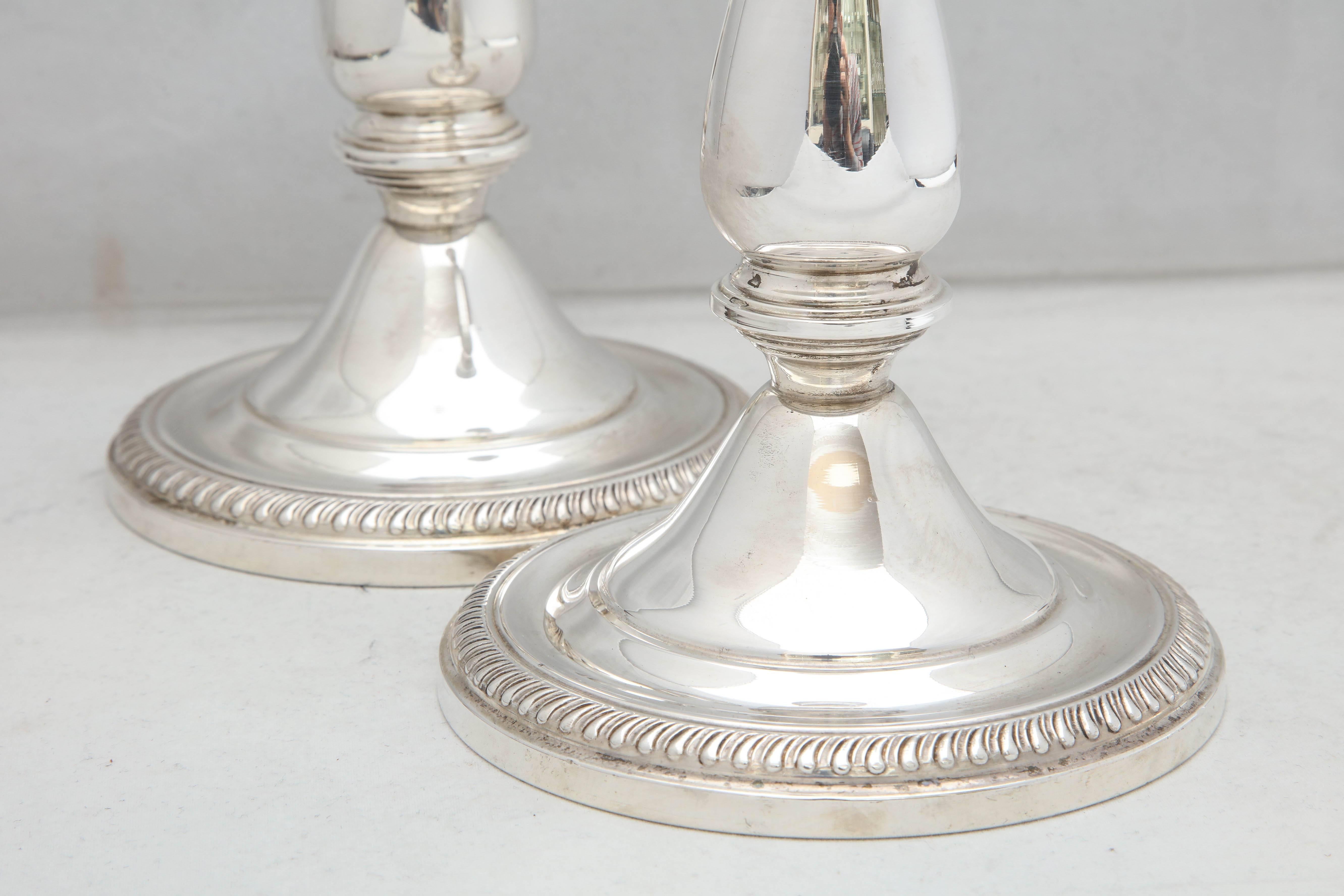 Pair of Tall Sterling Silver Empire-Style Candlesticks In Excellent Condition In New York, NY
