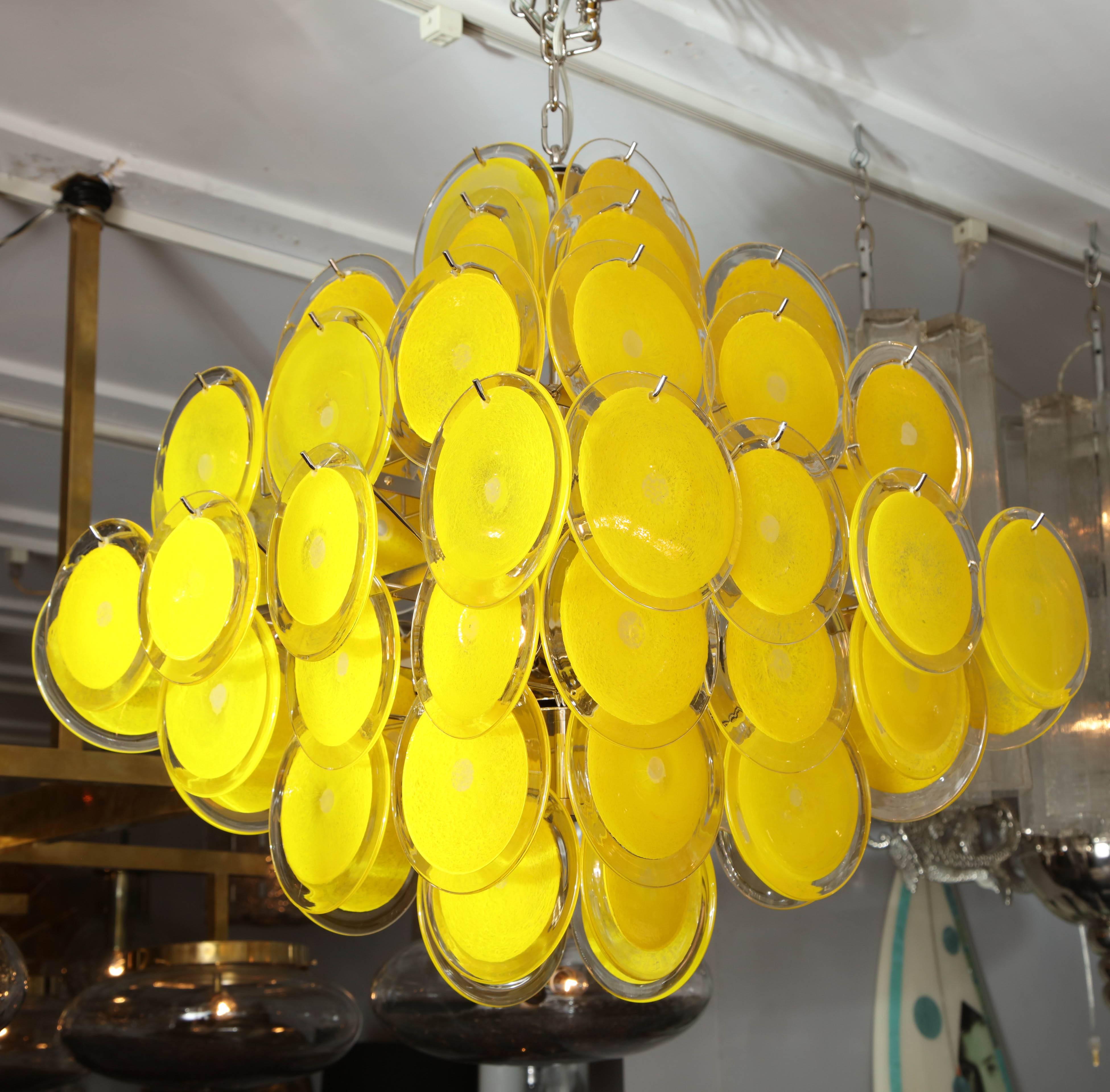 Vintage Murano glass yellow disc chandelier with custom-made frame.