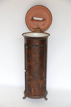 Unusual Small Sink in Metal Cabinet