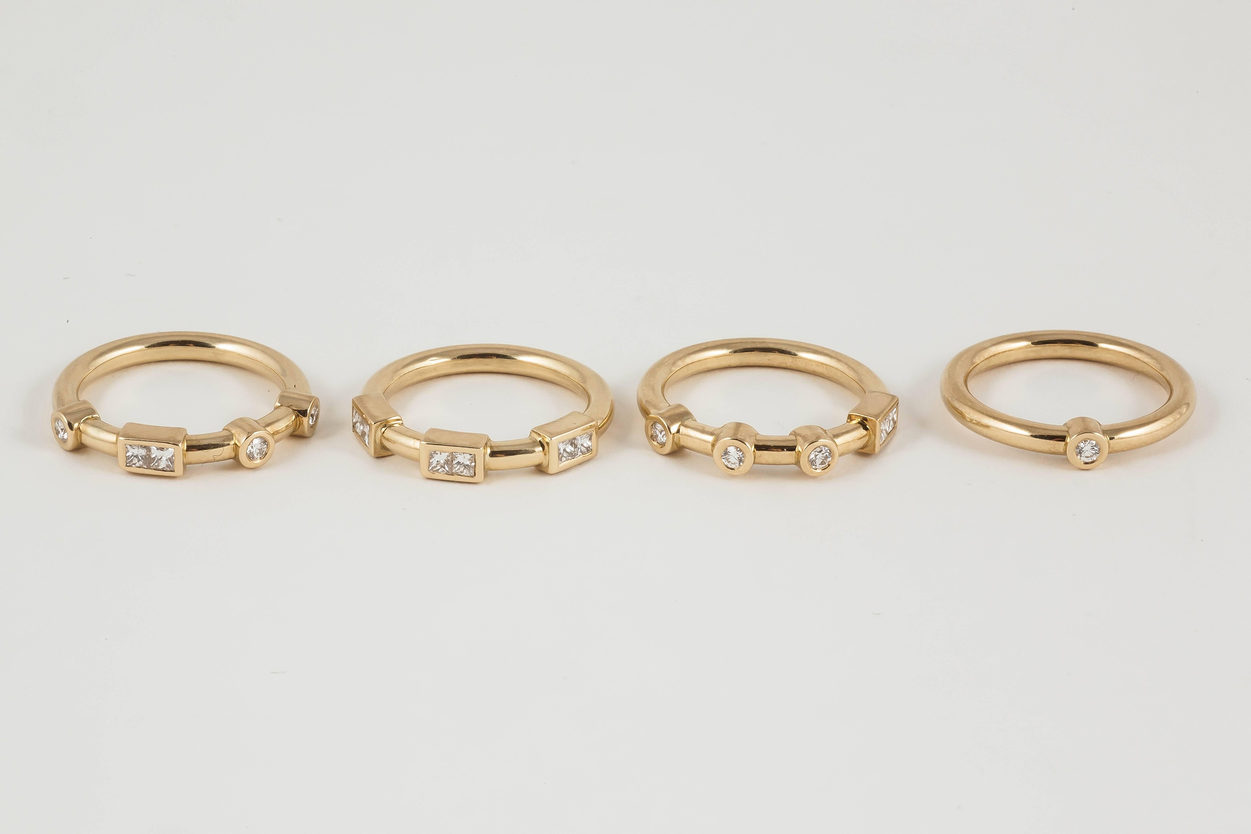 18k Yellow Gold and White Diamond Love Stacking Rings spelling 