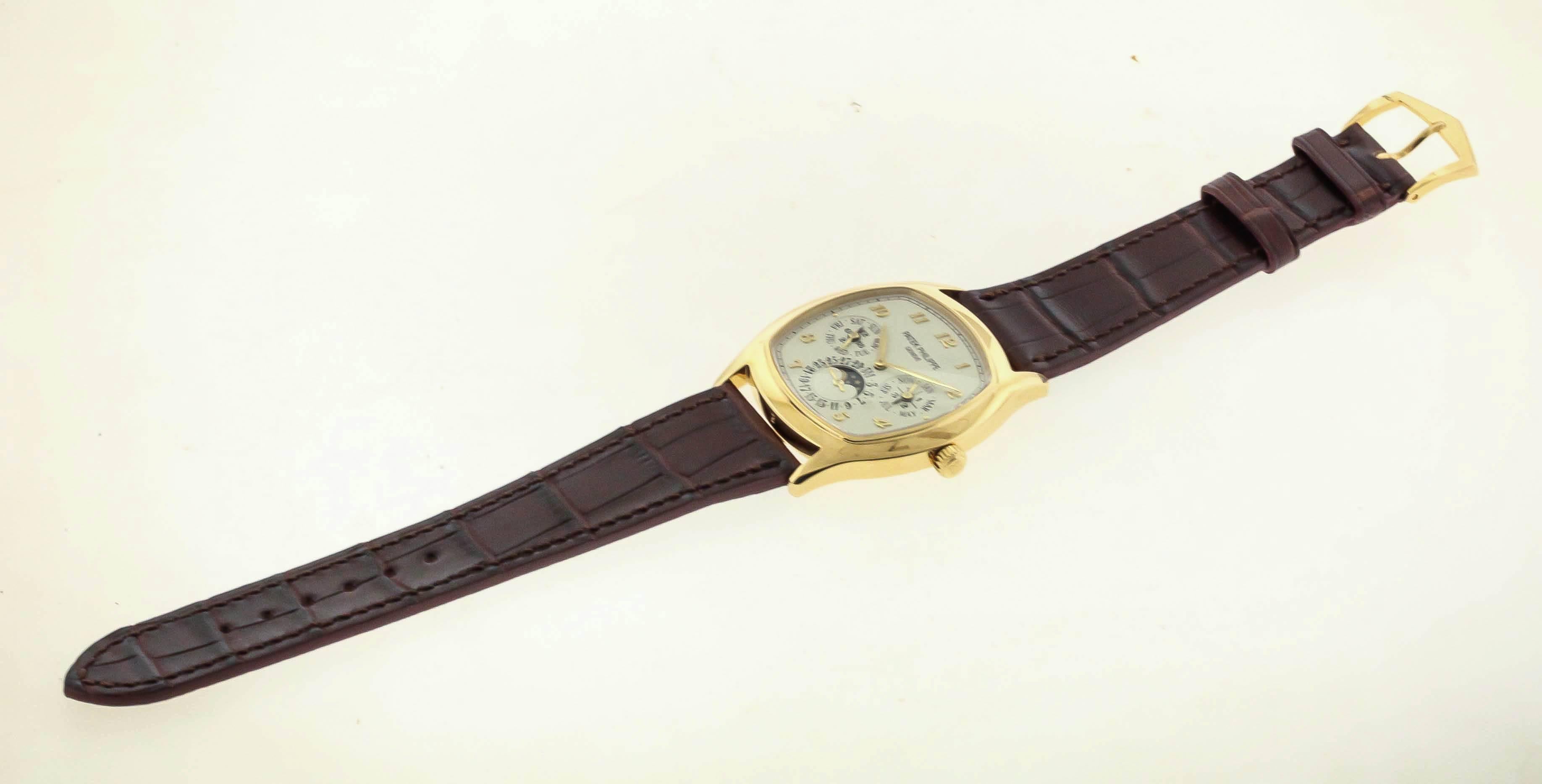 Patek Philippe Yellow gold Moonphase Perpetual Calendar Wristwatch Ref. 5940J  In Excellent Condition In New York, NY