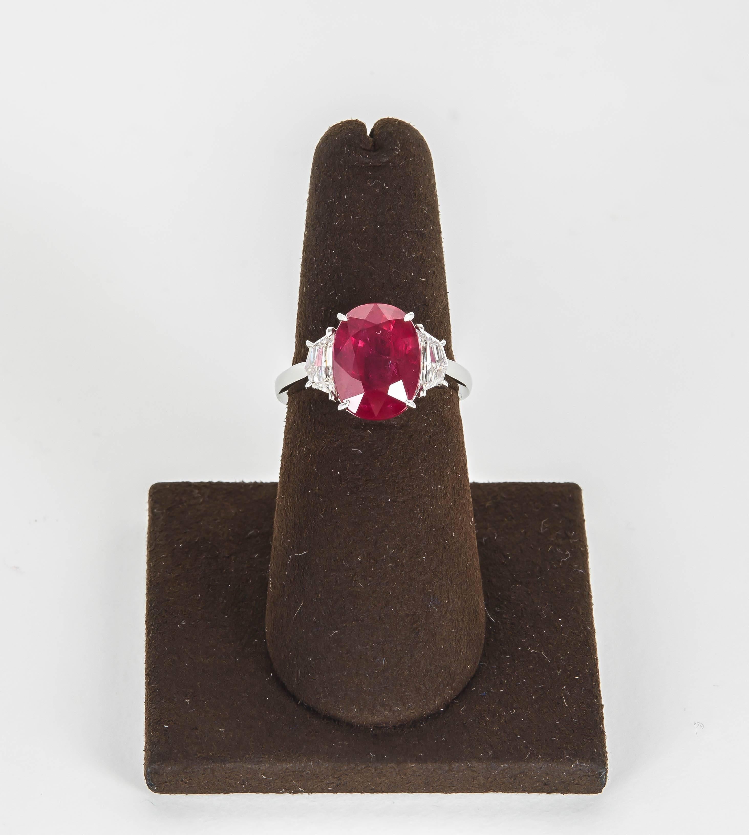 

An elegant Ruby ring. 

5.33 carat GIA certified Ruby set with special cut white side diamonds weighing 0.66 carats. 

Set in platinum. 