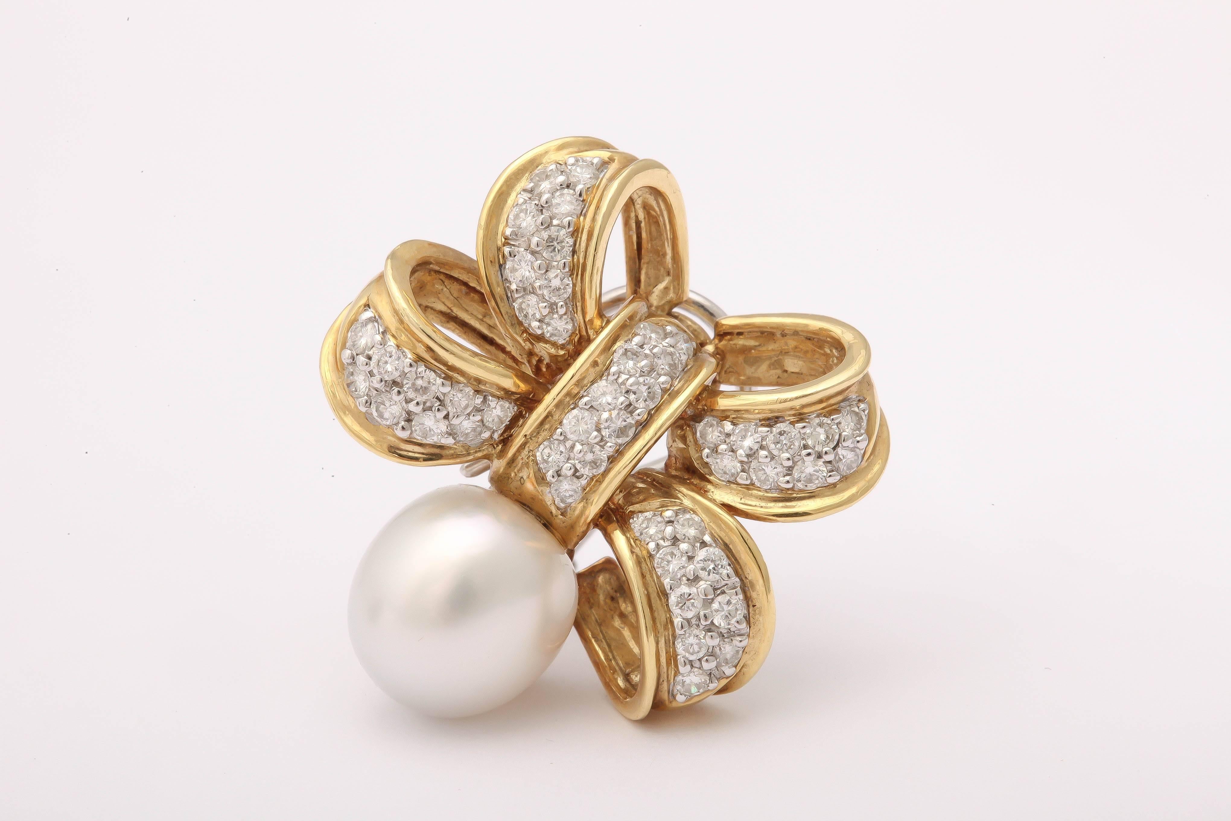 Classic and understated pearl Diamond gold Bow Earrings For Sale 1