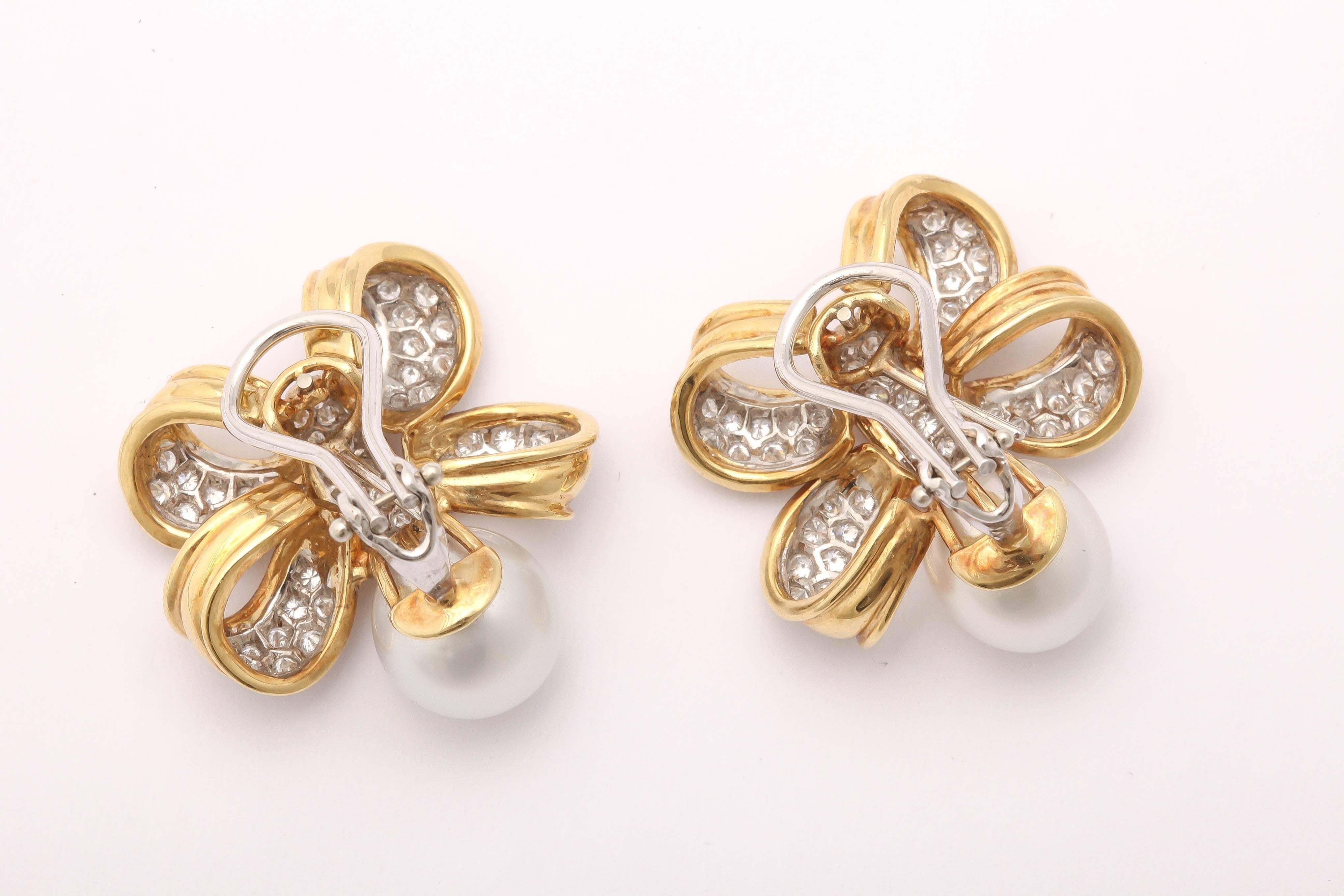 Classic and understated pearl Diamond gold Bow Earrings For Sale 2