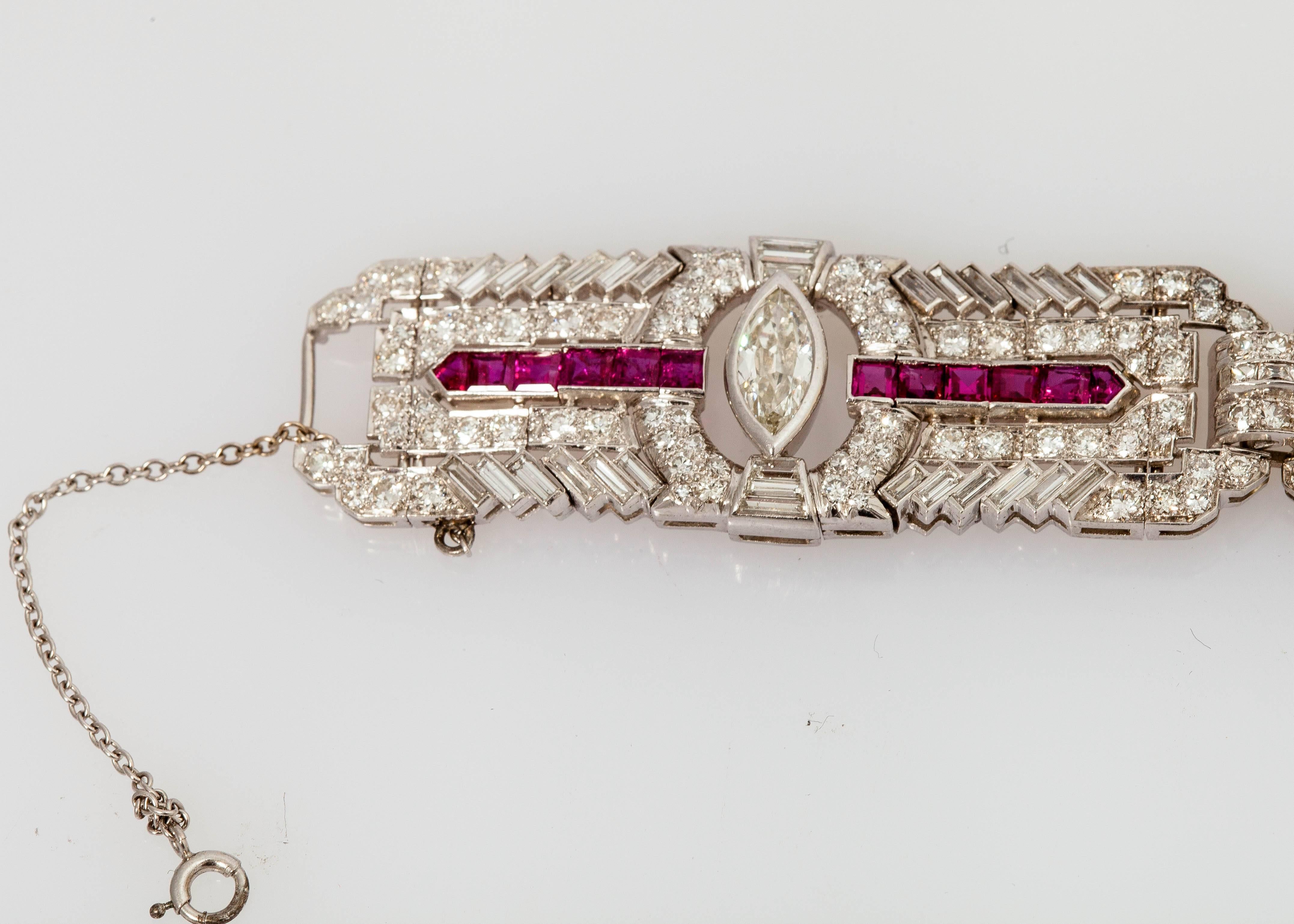 Beautiful Art Deco bracelet finely crafted in platinum, with rubies weighing approx.9.00 carats and a mix of cut diamonds: Marquise cut weighing $ 4.25 carats, round cut weighing 13.00 carats and baguette cut weighing 7.00 carats.