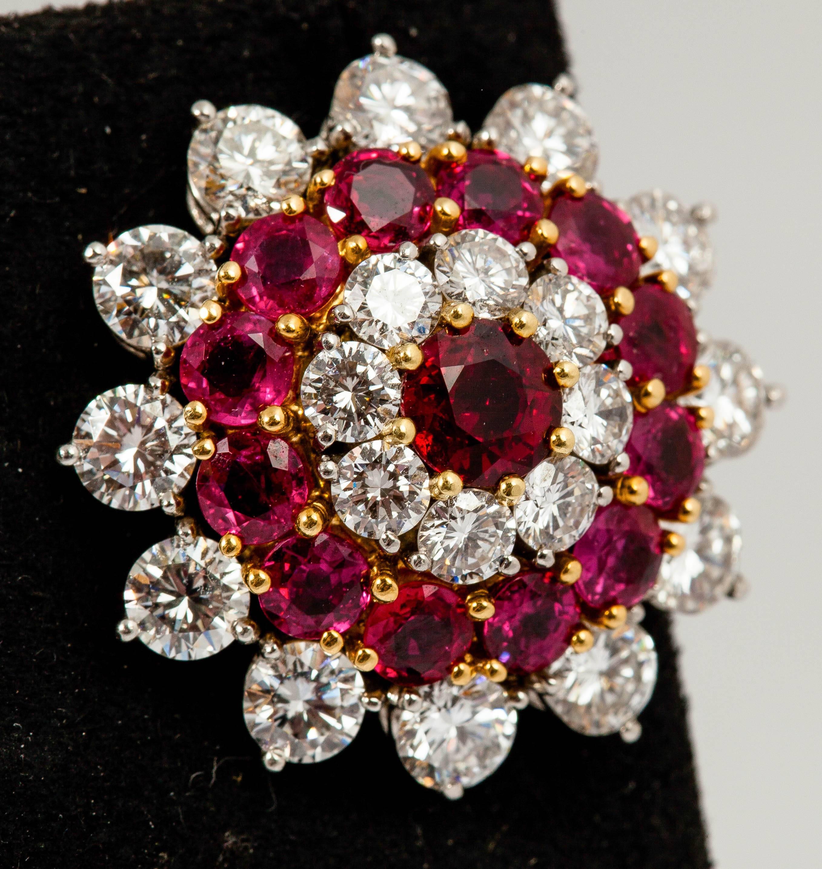 Designed as a stylized flower, set with  Rubies weighing 11.00 cts and brilliant cut diamonds weighing 10.00 cts, mounted in platinum and 18k yellow gold.