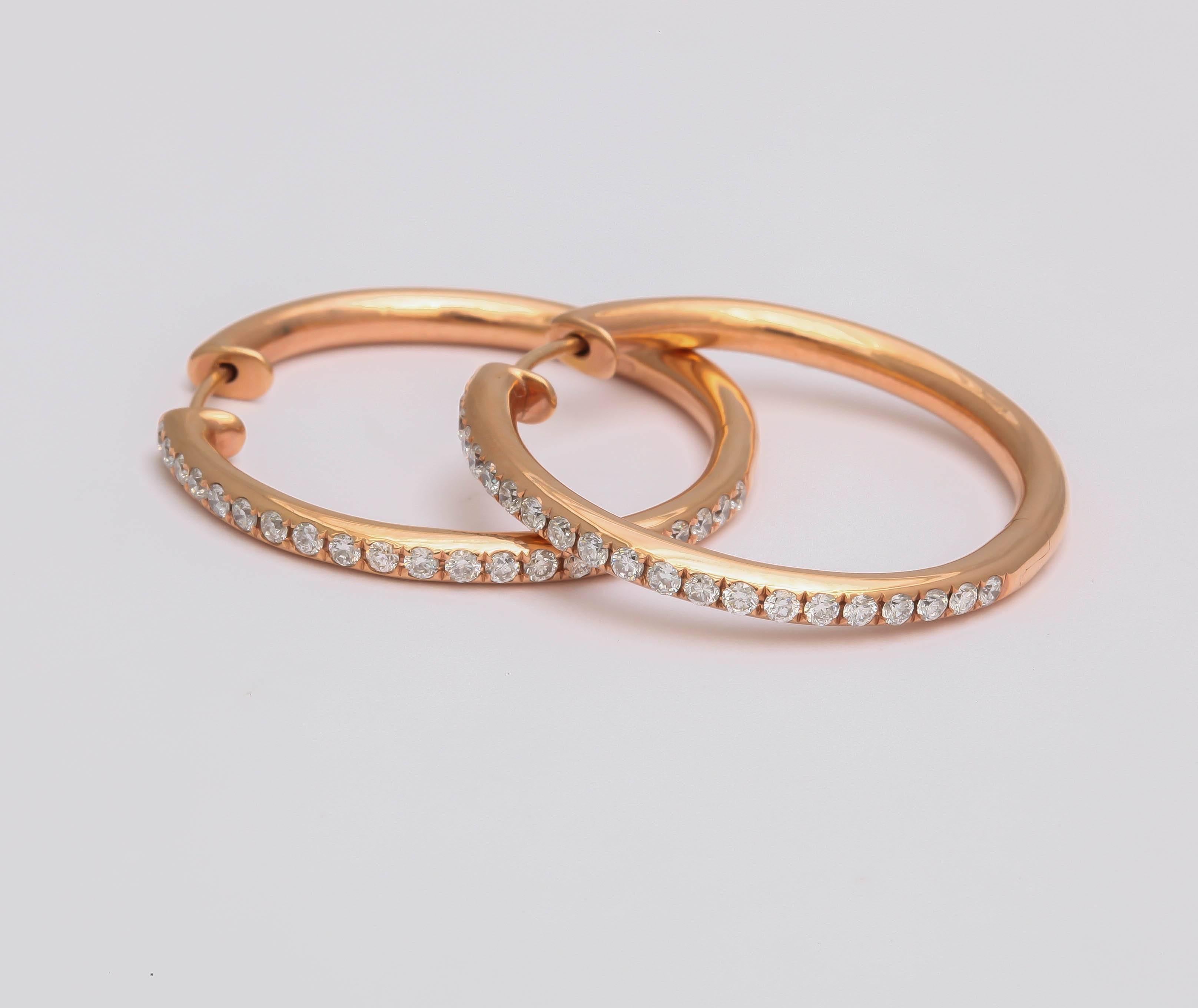 18KT rose gold earrings with white diamonds
