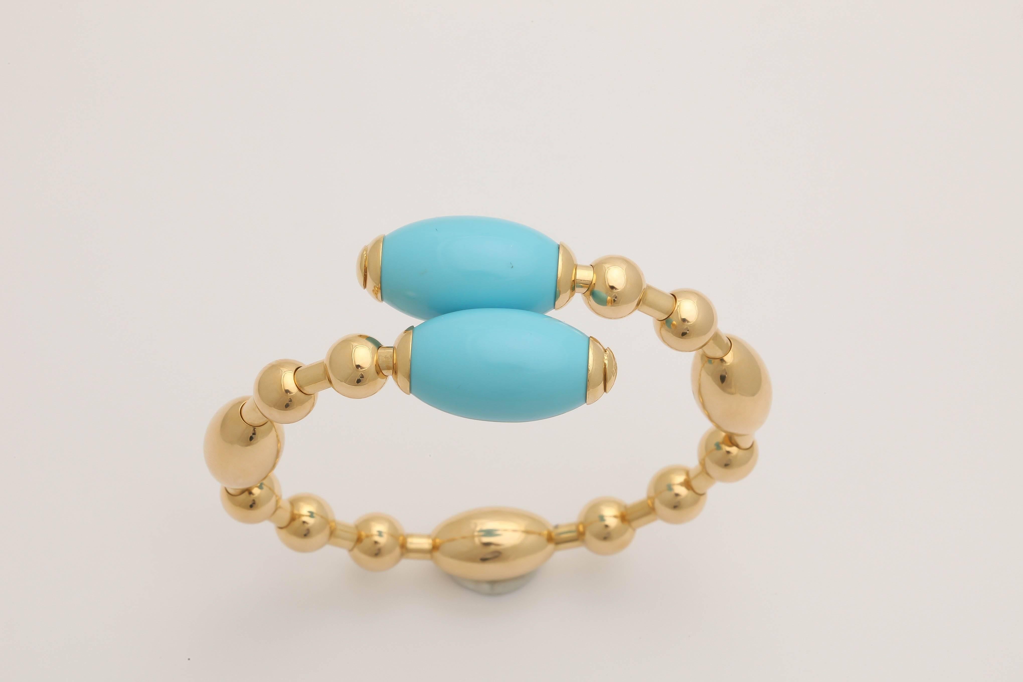 18k yellow gold turquoise bracelet.