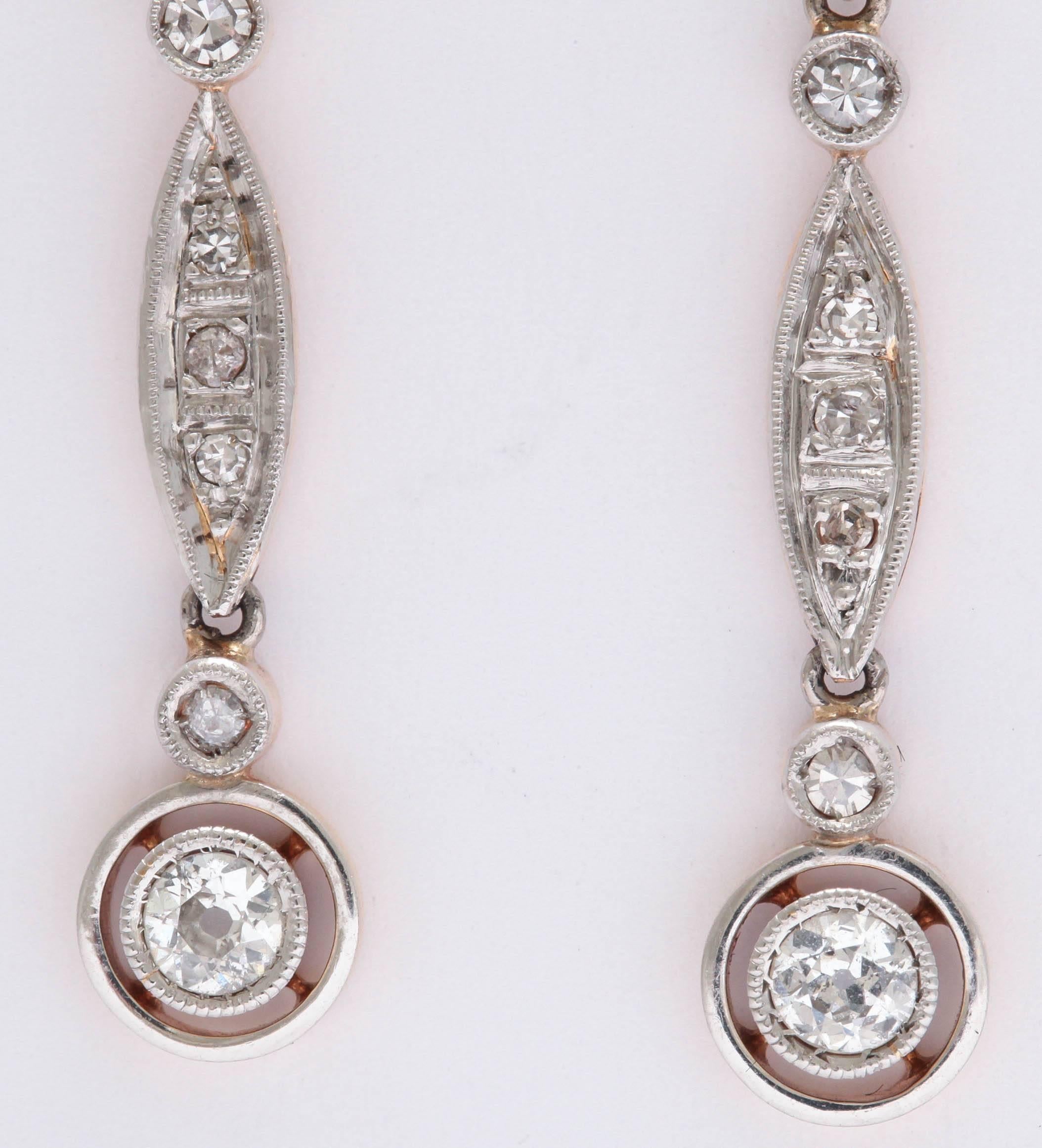 Antique Silver top & 18kt Yellow Gold back Drop Earrings.  Set in Millegrain and Pave. Delicate and very lovely - truly old.