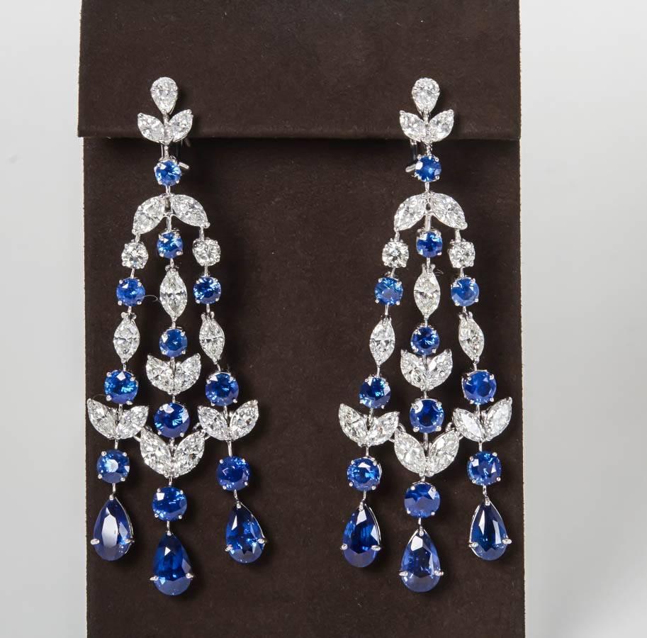 

A FABULOUS pair of sapphire and diamond chandelier earrings. 

24.68 carats of blue sapphire

13.36 carats of diamonds

Platinum

The perfect timeless design for an impressive yet wearable diamond earring with a pop of color!