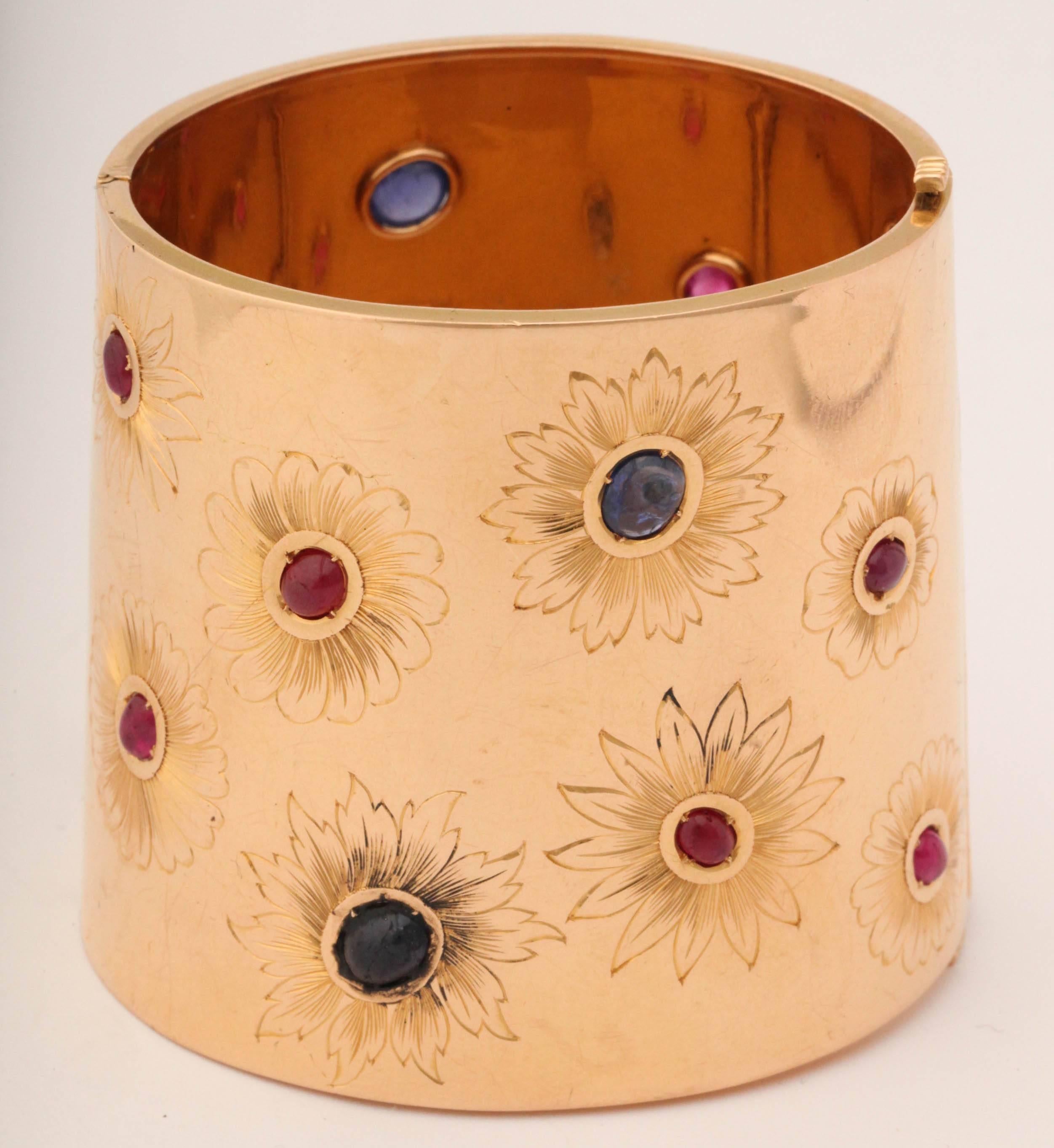 Magnificent 18kt Rise Gold Cuff - no marks - Perhaps 40's French -Cuff set with Bezel set Cabochon Rubies & Sapphires - embellished by stylized Engraved Flowers.  Had to have been a Pair or at least should have been   What Luxe.  Hinged closing.