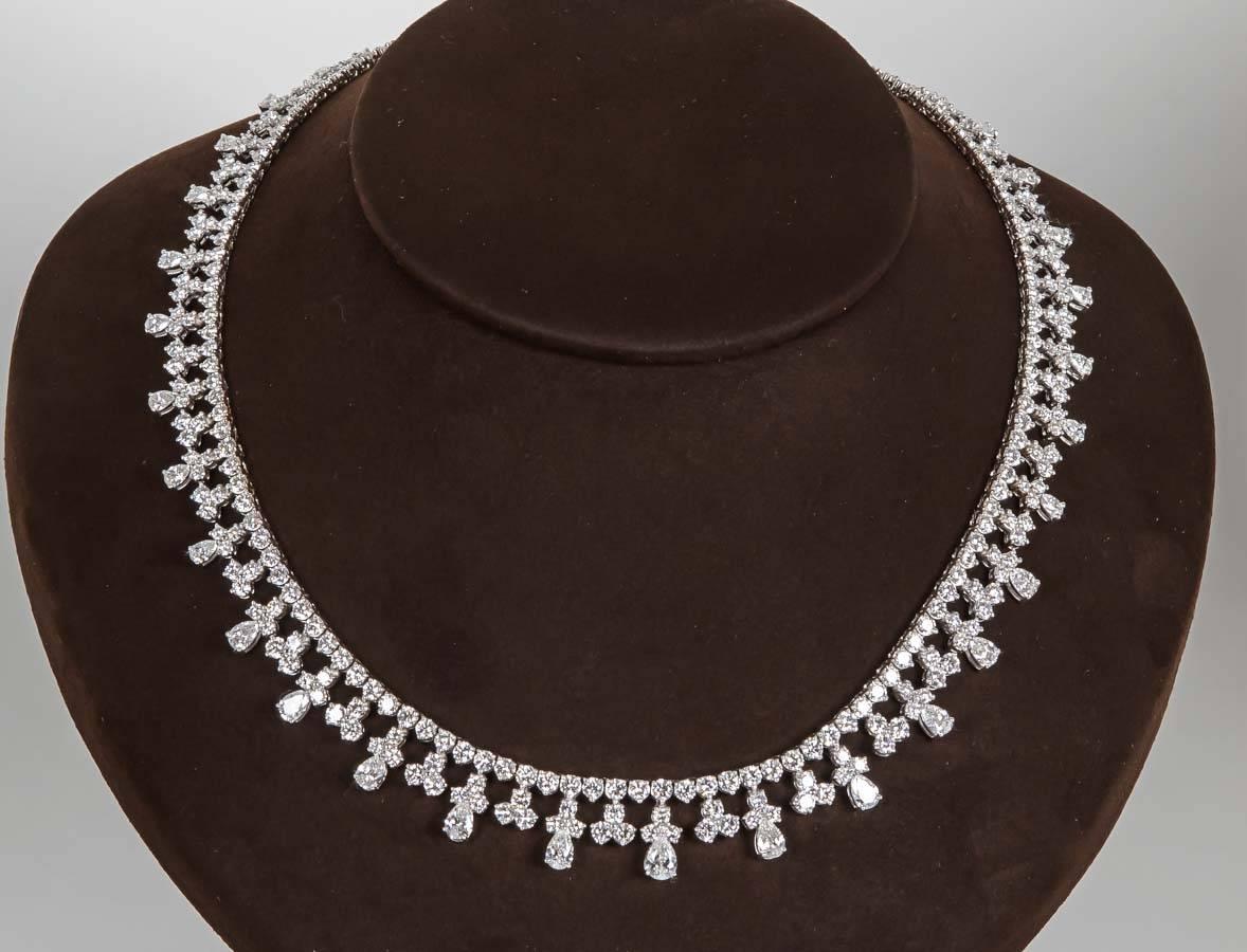 An elegant diamond necklace in a spectacular timeless design.

30.25 carats of colorless white VS diamonds set in 18k white gold. 

Stunning design of pear shape and round brilliant cut diamonds.

Please contact us for more information.