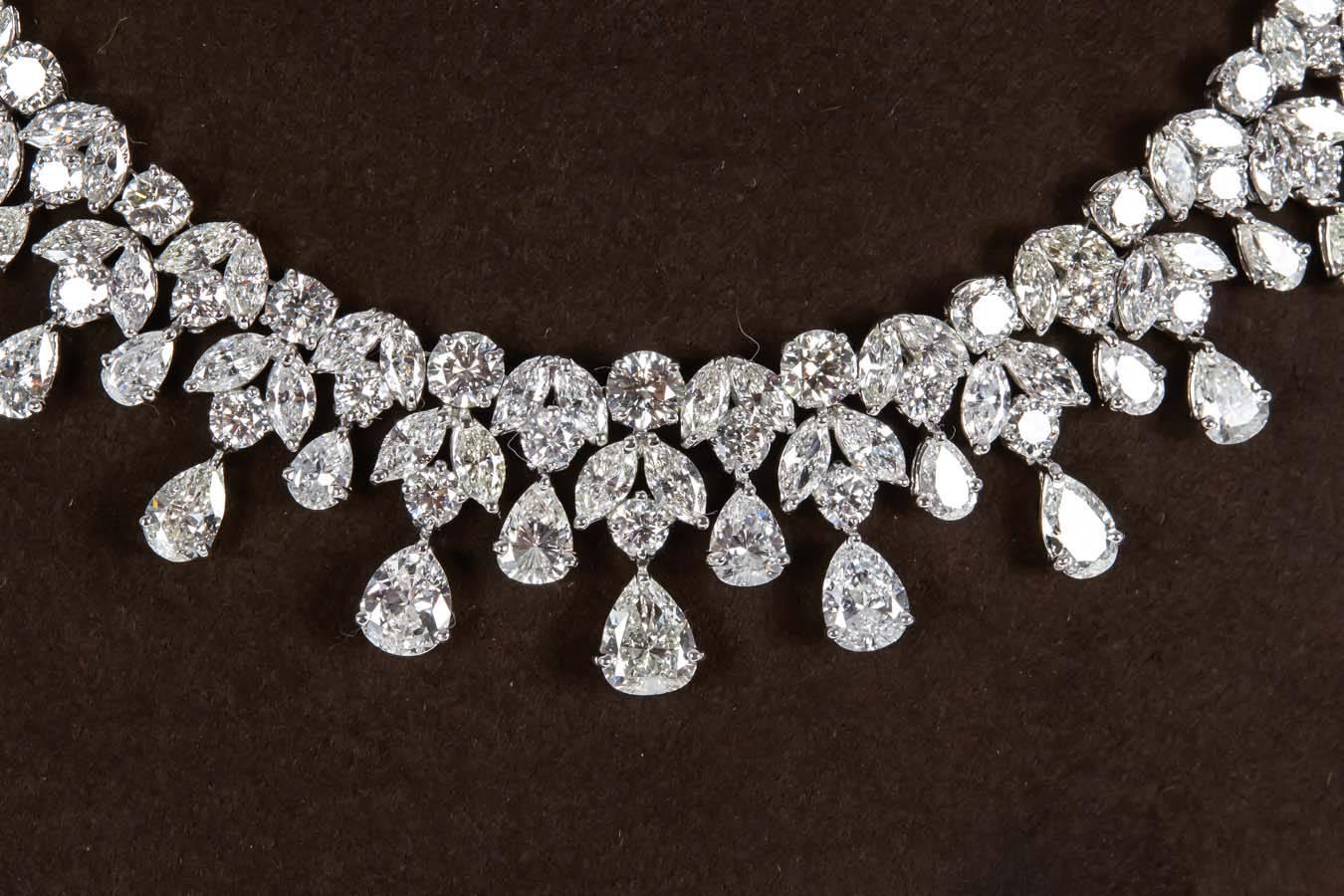 A fabulous piece!!

47.26 carats of pear, round and marquise cut diamonds. 

All FG in color VS clarity set in 18k white gold. 

An incredible statement necklace in a timeless design!