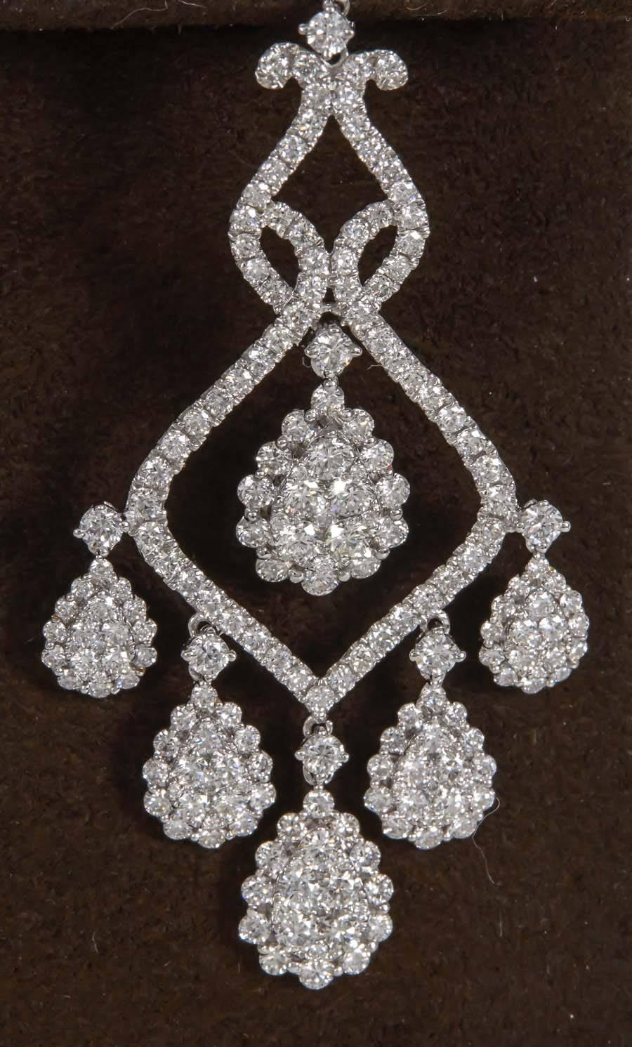 7.01 carats of sparkle set in a gorgeous design!

F color VS clarity round brilliant cut diamonds set in 18k white gold. 

Approximately 2.25 inches long.