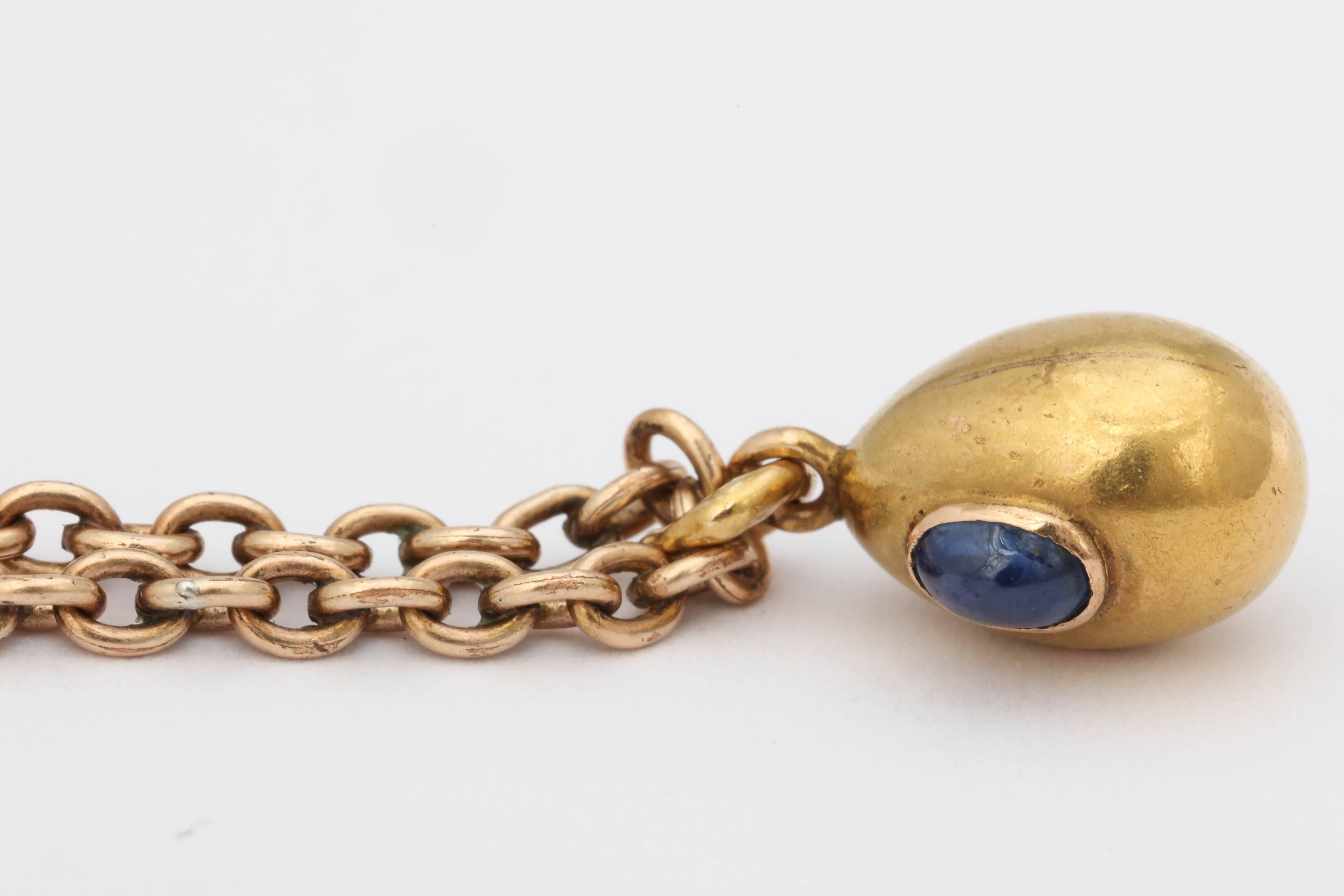 Women's 1900s Small Russian Sapphire Gold Easter Egg Pendant