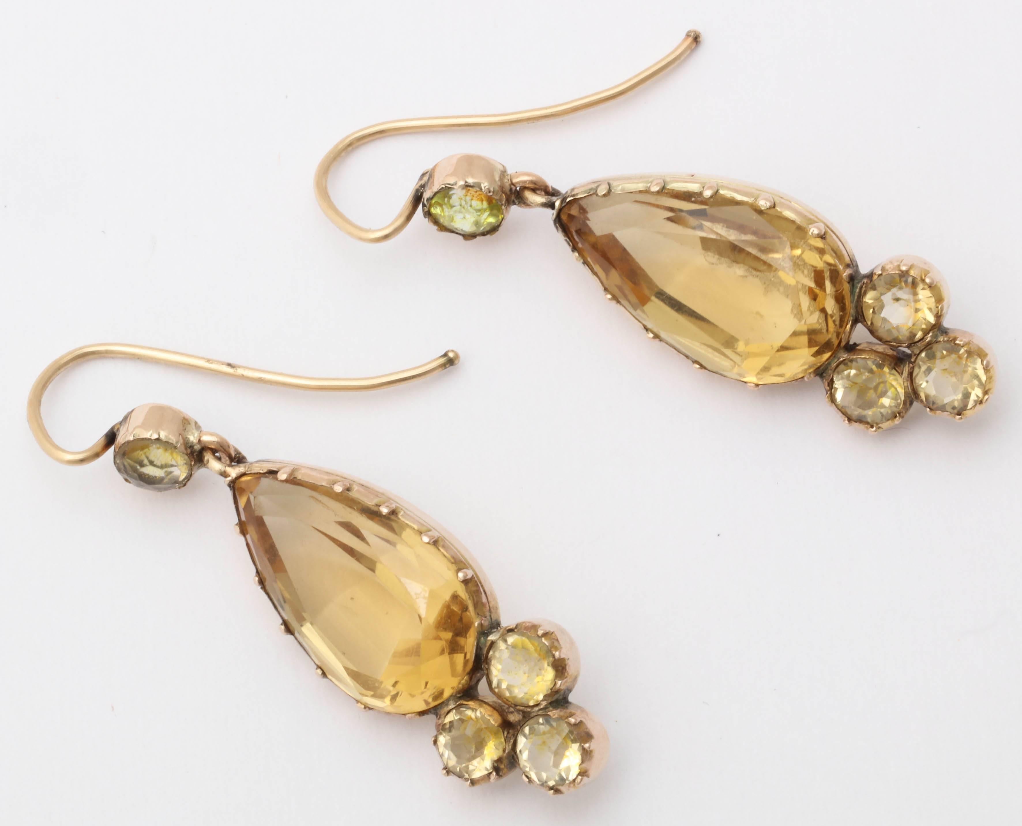 Let the sunshine in any time of the year with Victorian citrine earrings that flash light and are light on the ear as well. Quite modern in style, the earrings fit attractively in to any outfit from denim to your party black dress. Four round