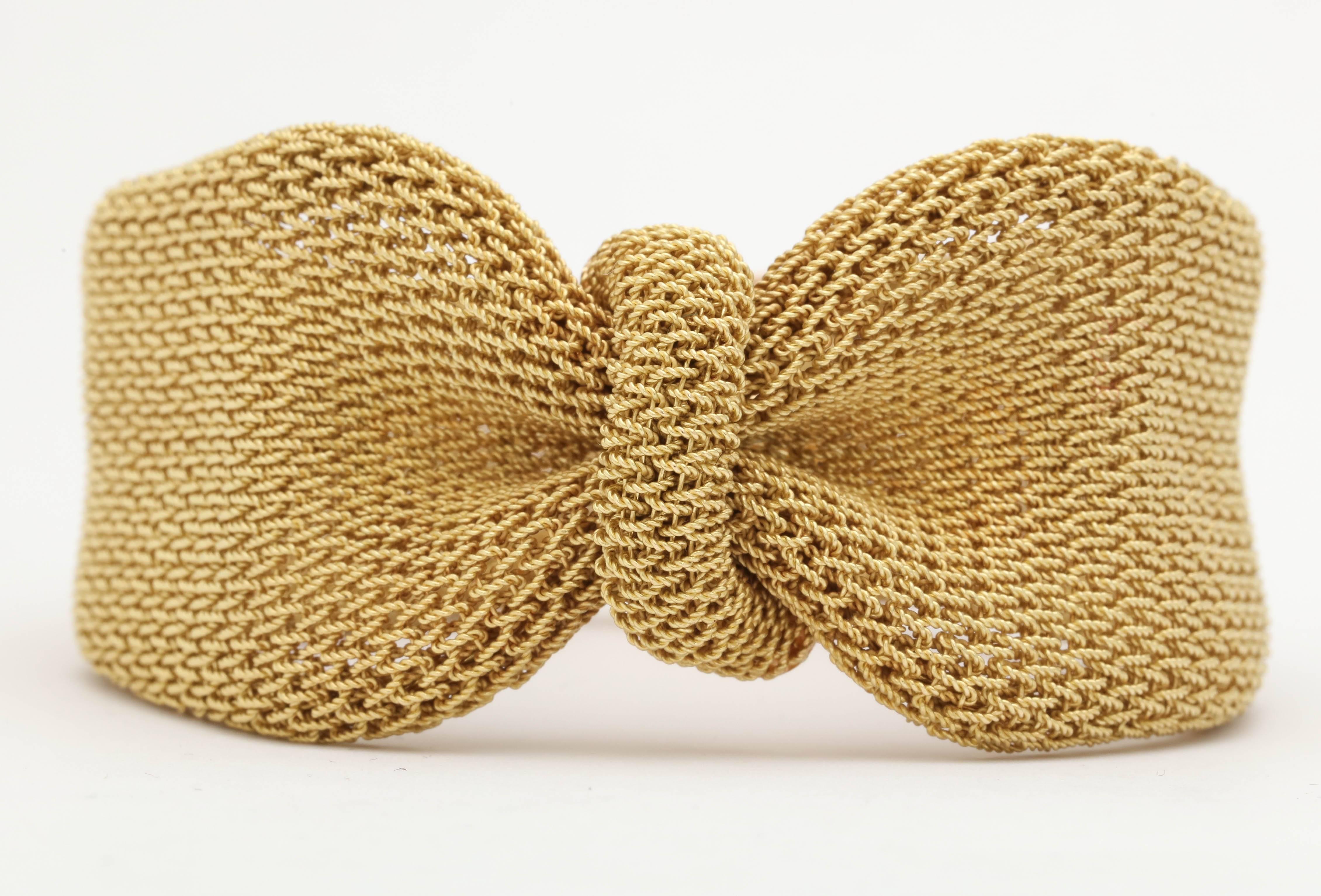 18kt yellow gold handmade mesh bracelet consisting of numerous hand woven links to emulate fabric . Designed in a Bow Knot Motif in the 1960's & Made in ITALY