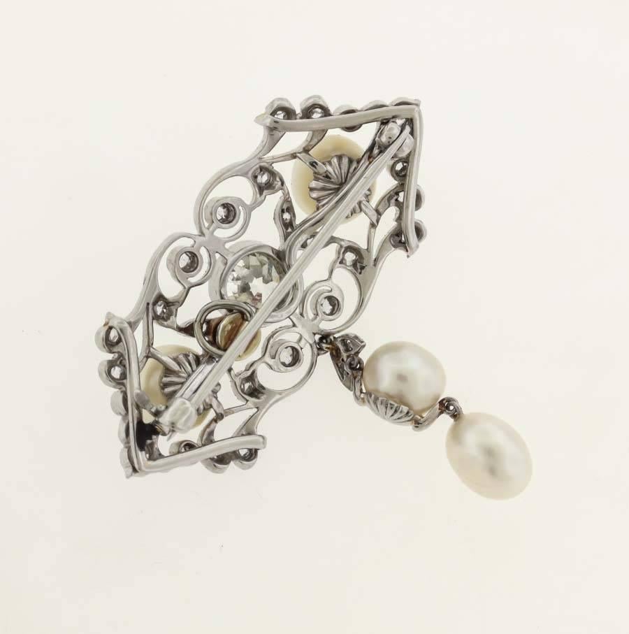 Edwardian Natural Pearl Diamond Platinum Brooch In Excellent Condition In New York, NY