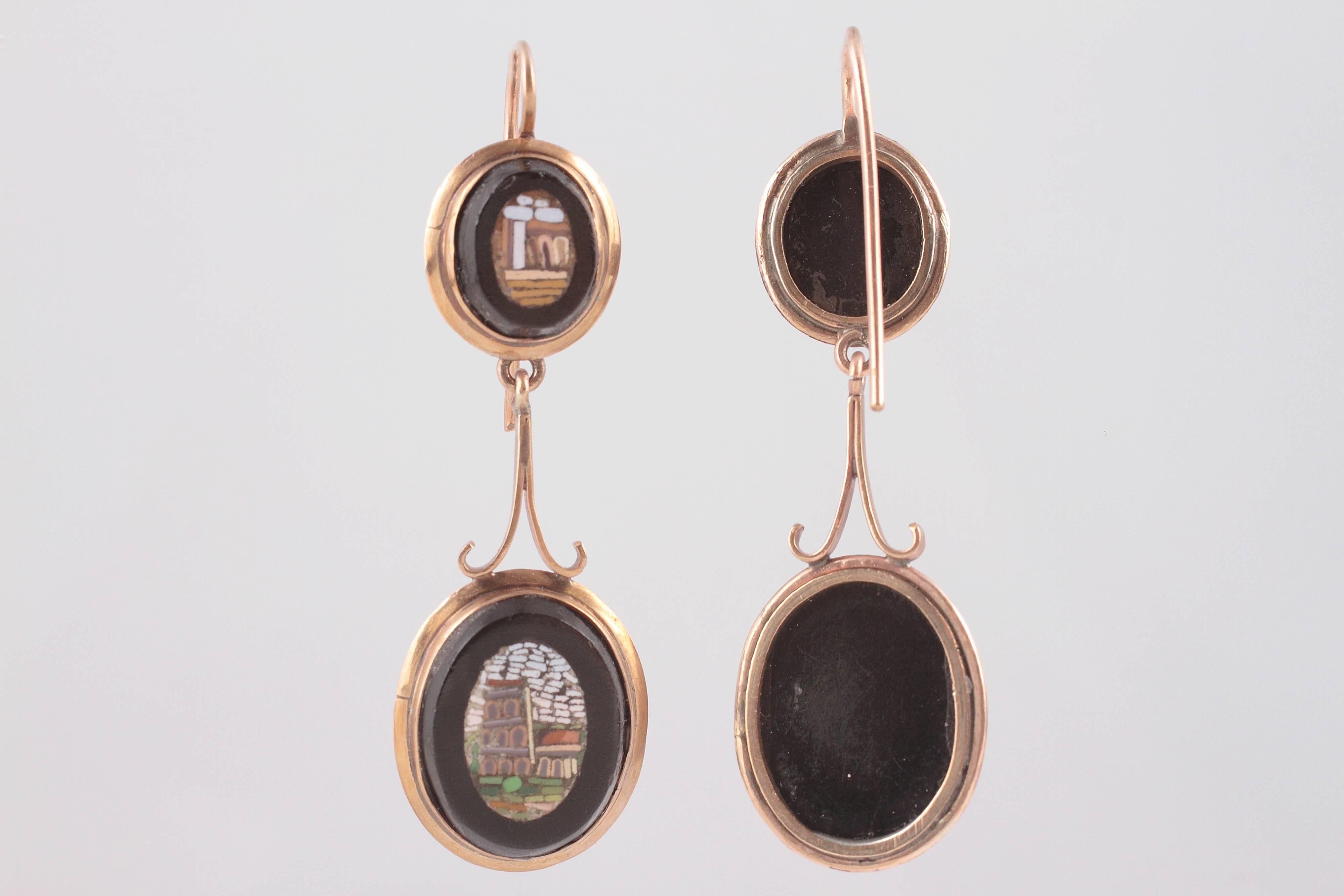 Beautifully simple 9 karat gold frames securing four unique detailed micro mosaic scenes suspended from elegant wires.  We brought this wonderful pair of earrings back from our last trip to Italy.  A testament to the craftsmanship of the era. 
