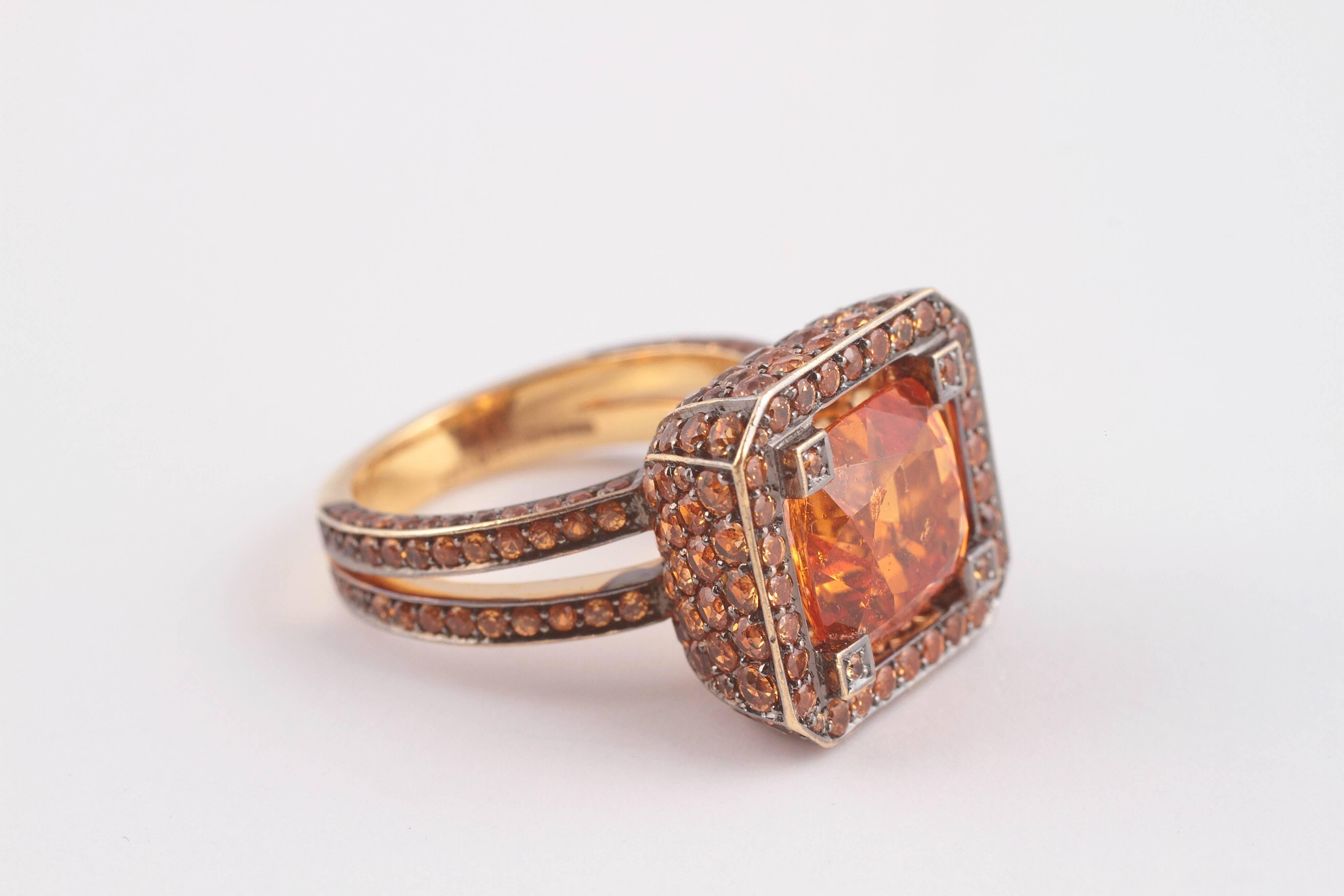 This 3.80 ct Mandarian garnet ring fairly glows with color.  In fact, it could be the sunshine of your life.  Solange is London based, size 6.50 