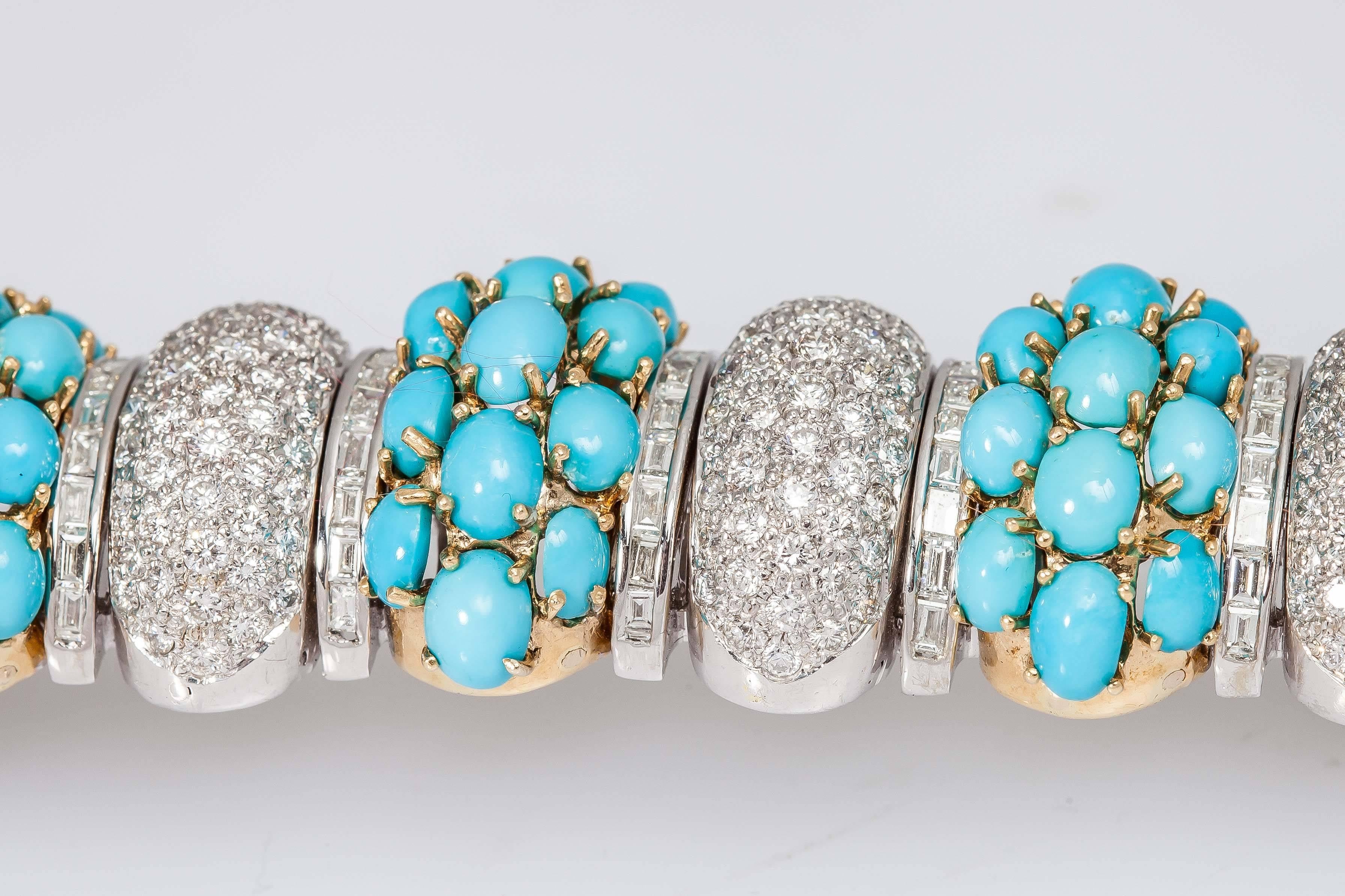 Beautiful turquoise and diamond bracelet finely crafted in 18k yellow and white gold. This bracelet has diamonds which weigh approx. 15.75 carats and turquoises which weigh approx. 41.75 carats.