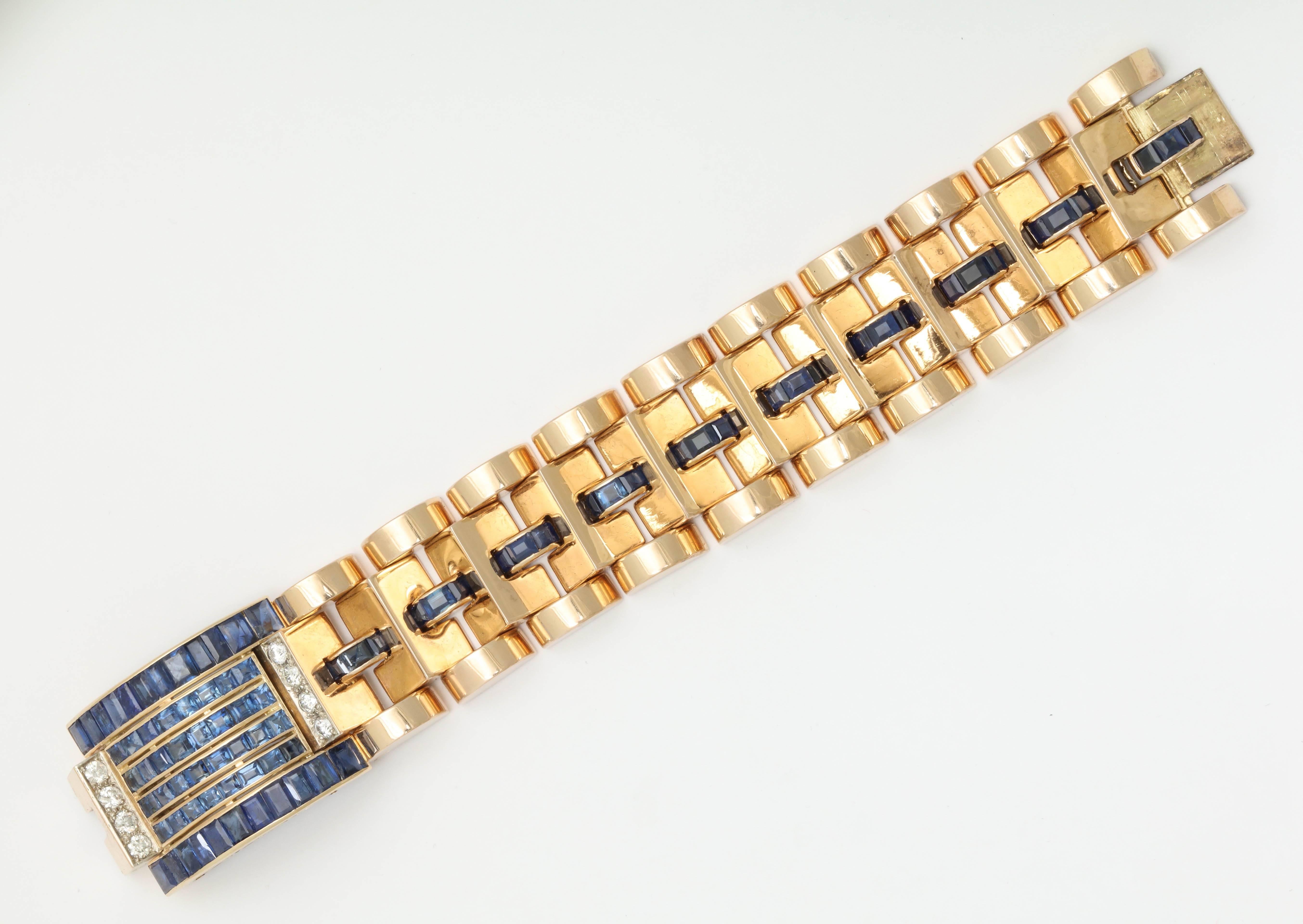 14kt Rose Gold Flexible Link Bracelet Embellished with numerous beautiful color custom cut calibrated Sapphires And Further Designed With 8 full cut diamonds weighing approximately 1.50 cts and weight of Sapphires weighing approximately 10 carats.
