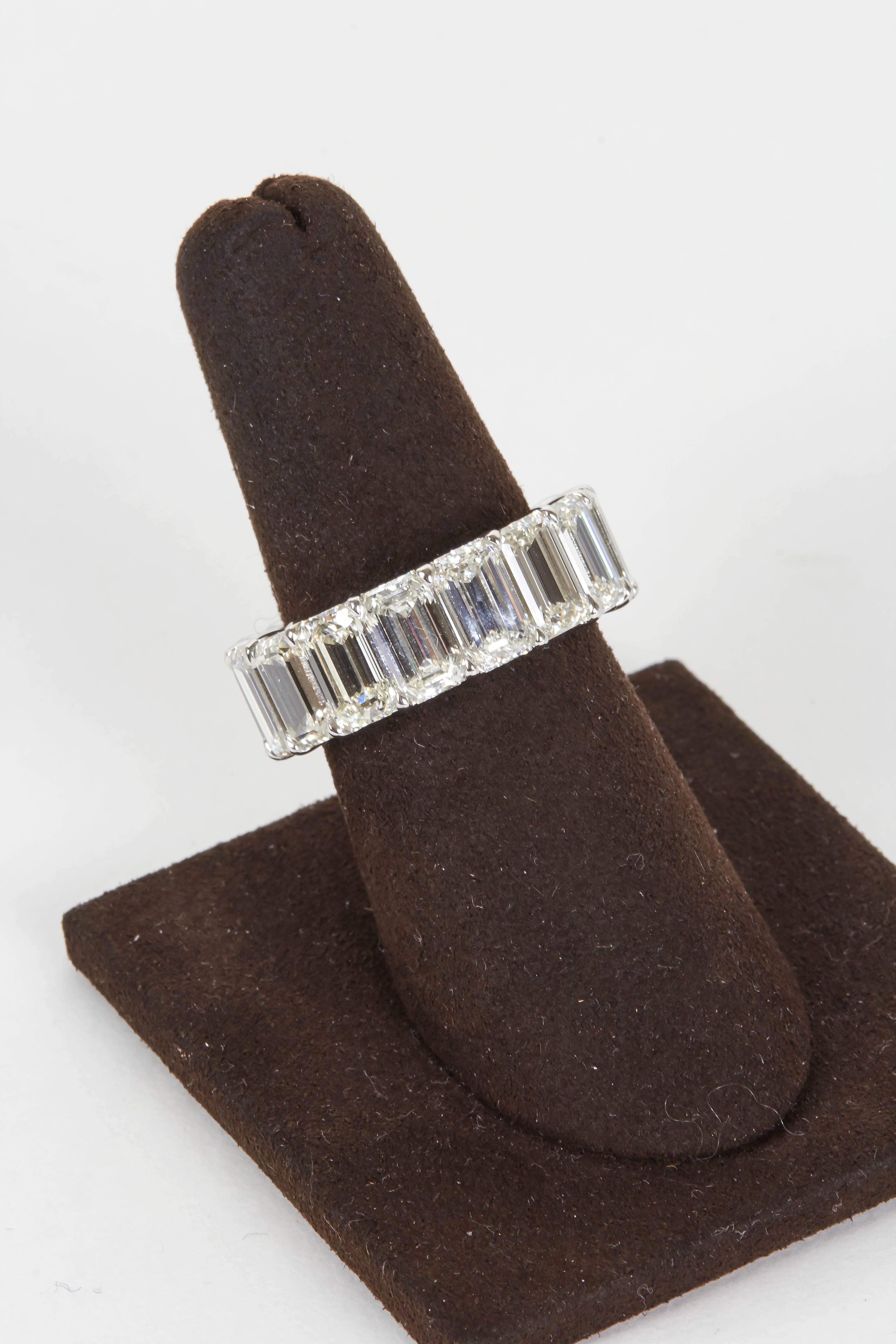 A magnificent diamond band.

15.88 carats of G color VVS-VS clarity Emerald Cut diamonds. 

Each diamond measures over 1 carat size. 

The ring size is 6.5 but can be adjusted.

A must have statement ring! 