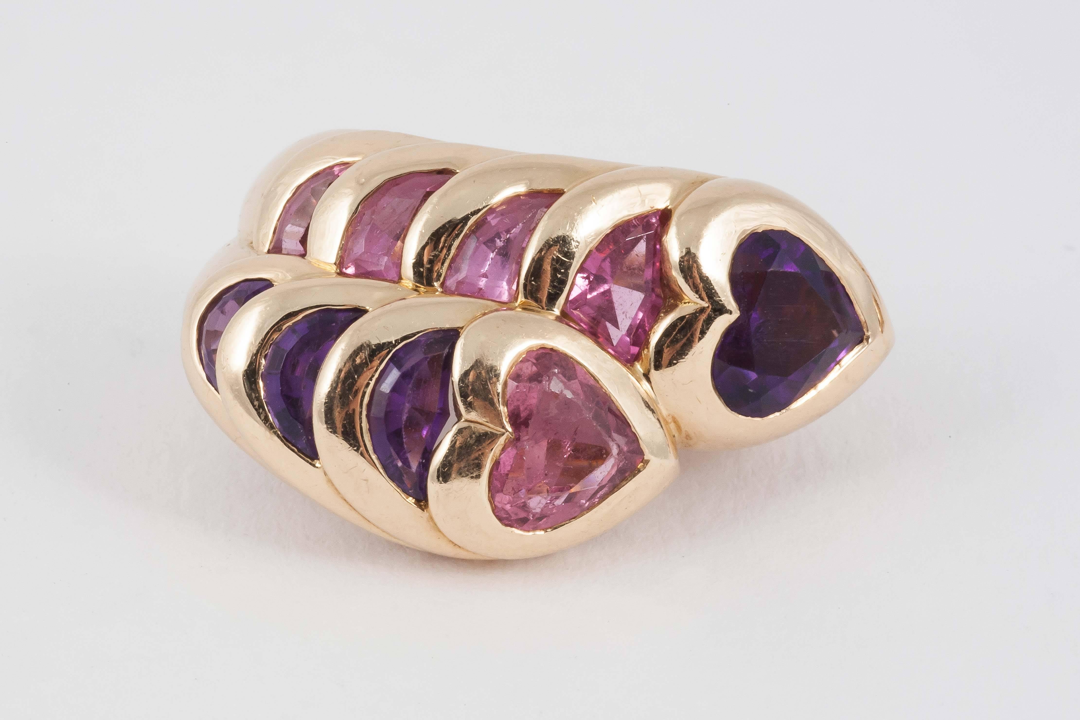 A finely made pair of 18ct gold earrings and matching ring set with heart shaped and other shaped Pink Tourmalines and Amethysts,French marked,c,1970-80.the ring size USA 7.5