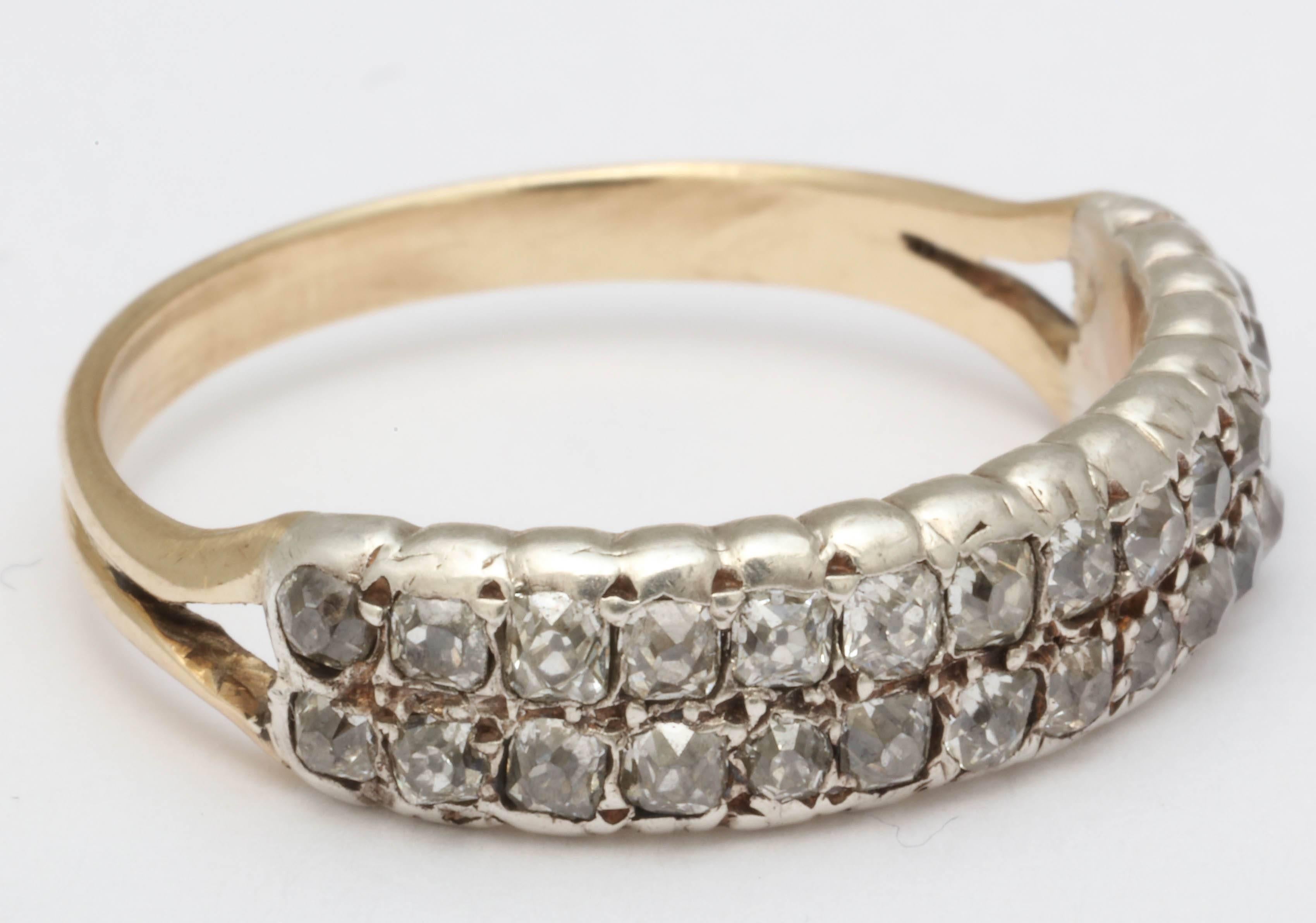 Double row diamond band made c.1800. This Georgian stunner has 30 diamonds weighing approximately .03-.05cts each totalling just under .75ctw. The ring is silver on gold and has a closed back setting all indicative of this period. 