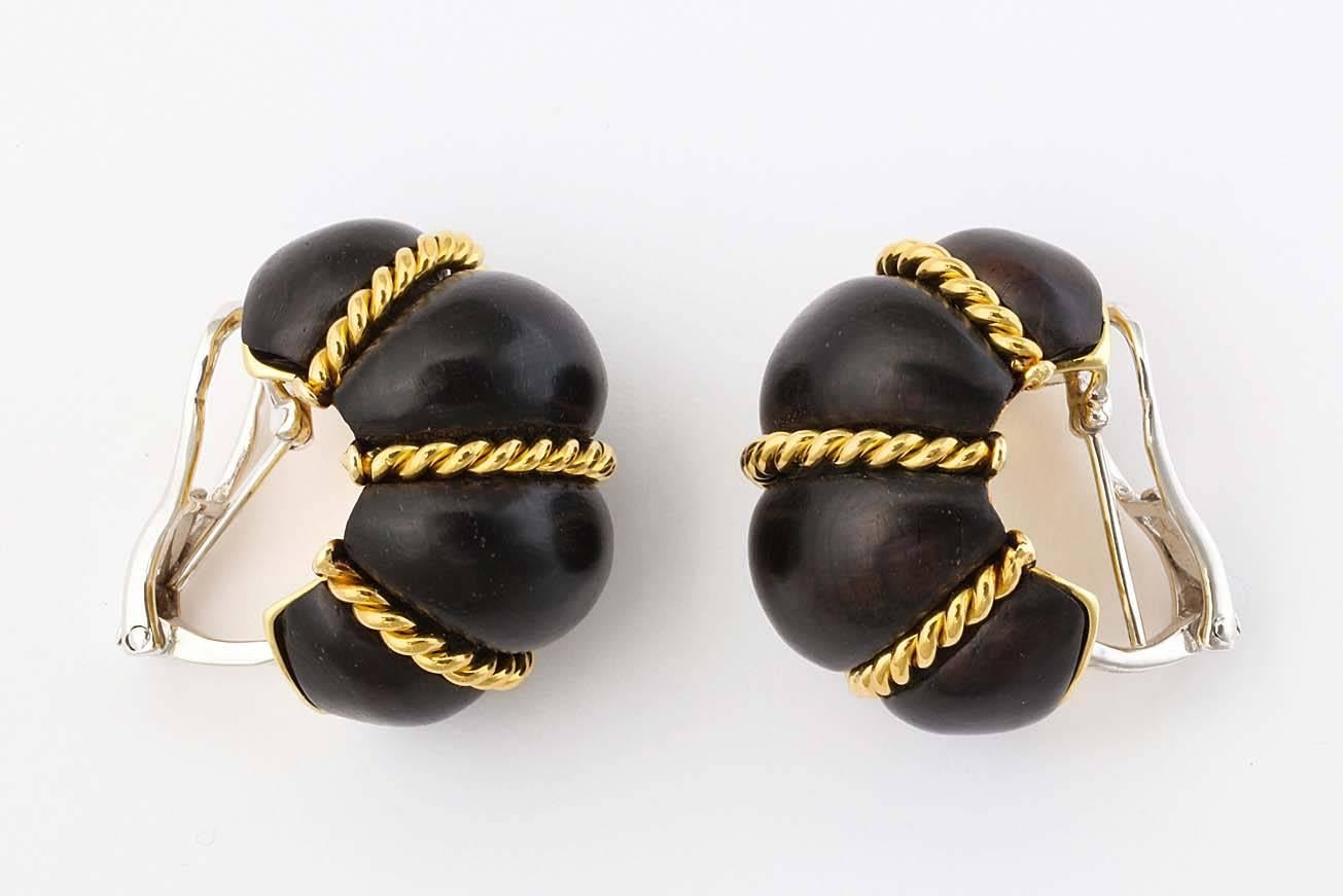 Contemporary gold ebony shrimp earrings  For Sale