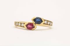 1980s Fred Paris Cross Over Sapphire Ruby Diamond Gold Ring