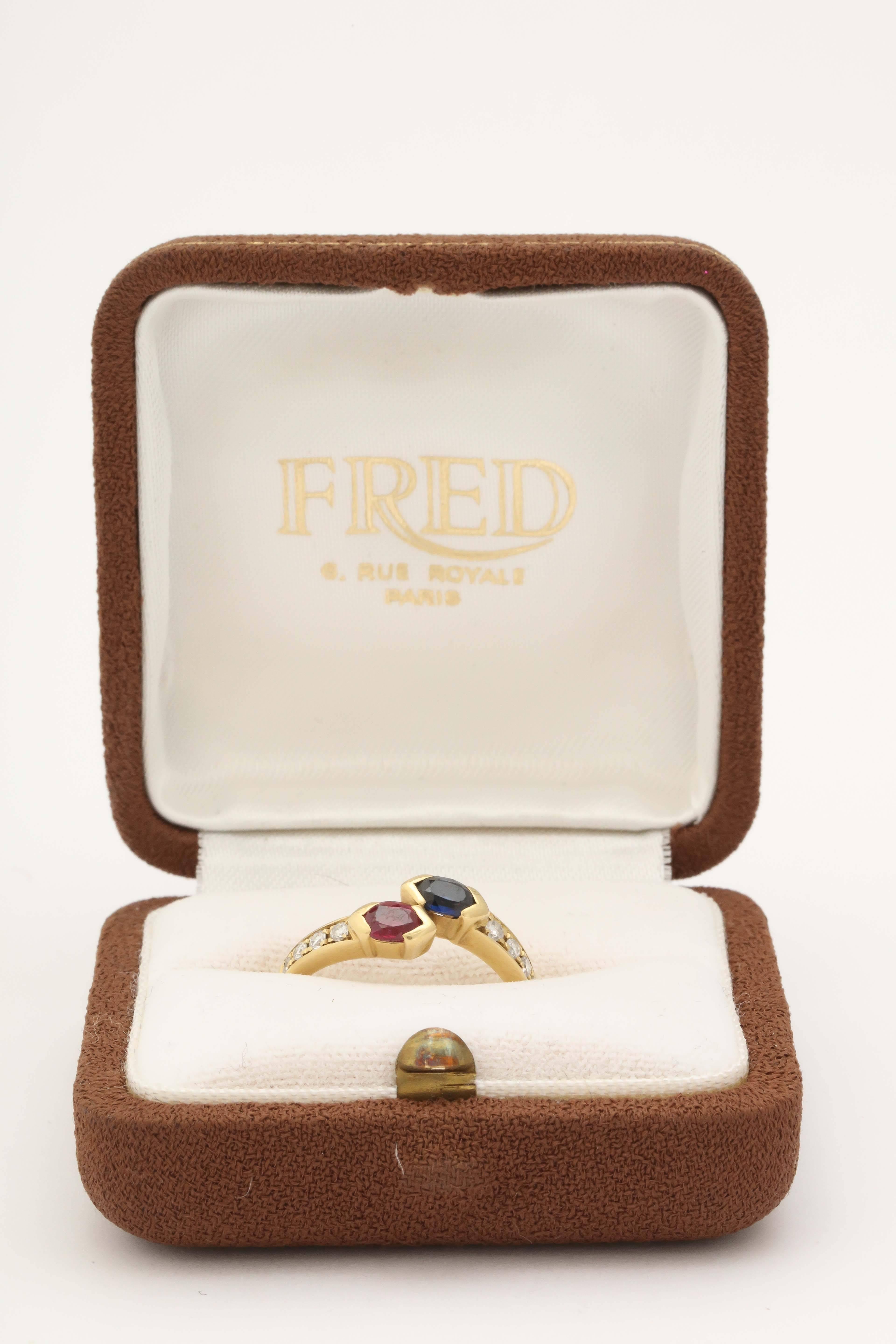 Contemporary 1980s Fred Paris Cross Over Sapphire Ruby Diamond Gold Ring