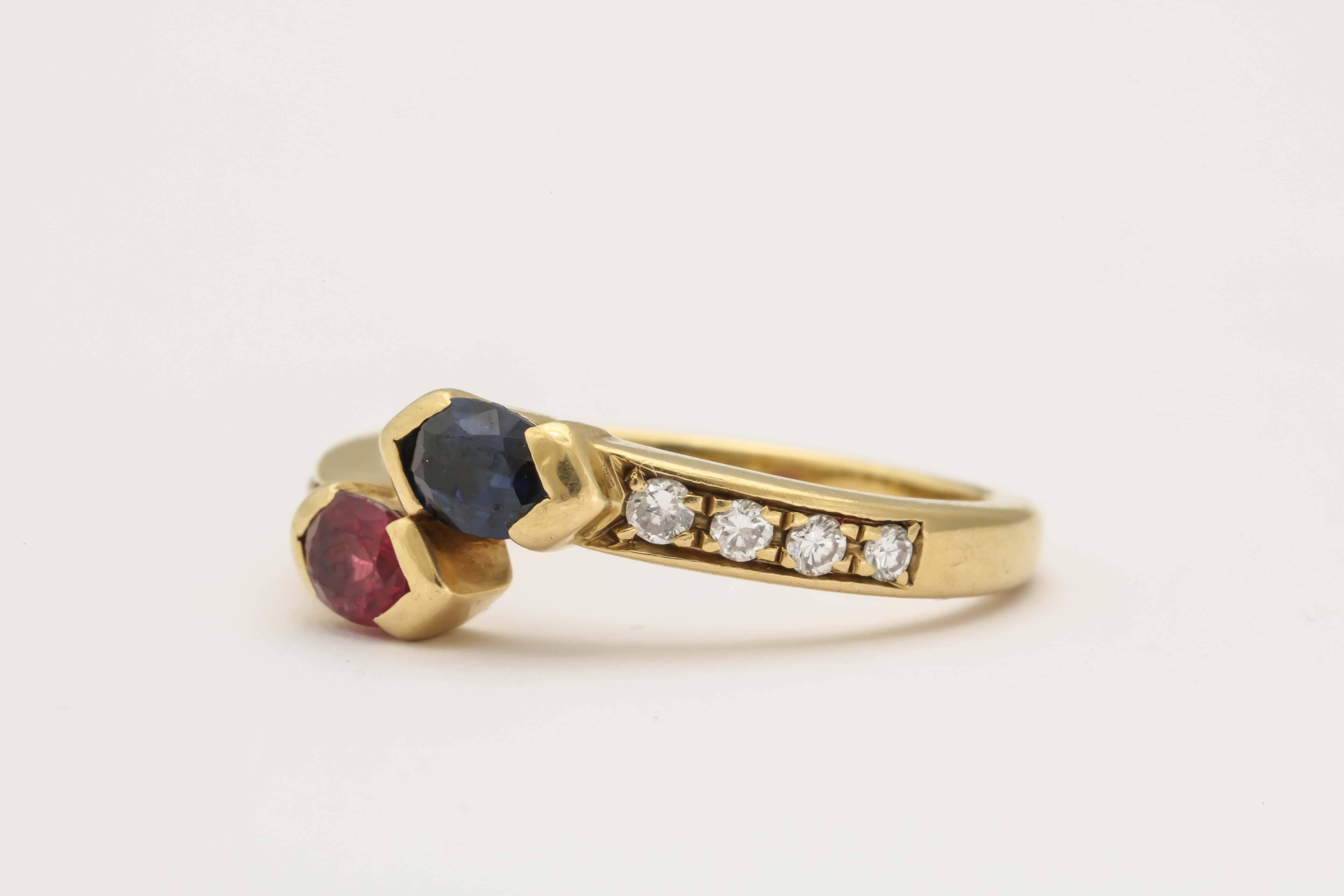 1980s Fred Paris Cross Over Sapphire Ruby Diamond Gold Ring In Excellent Condition In New York, NY