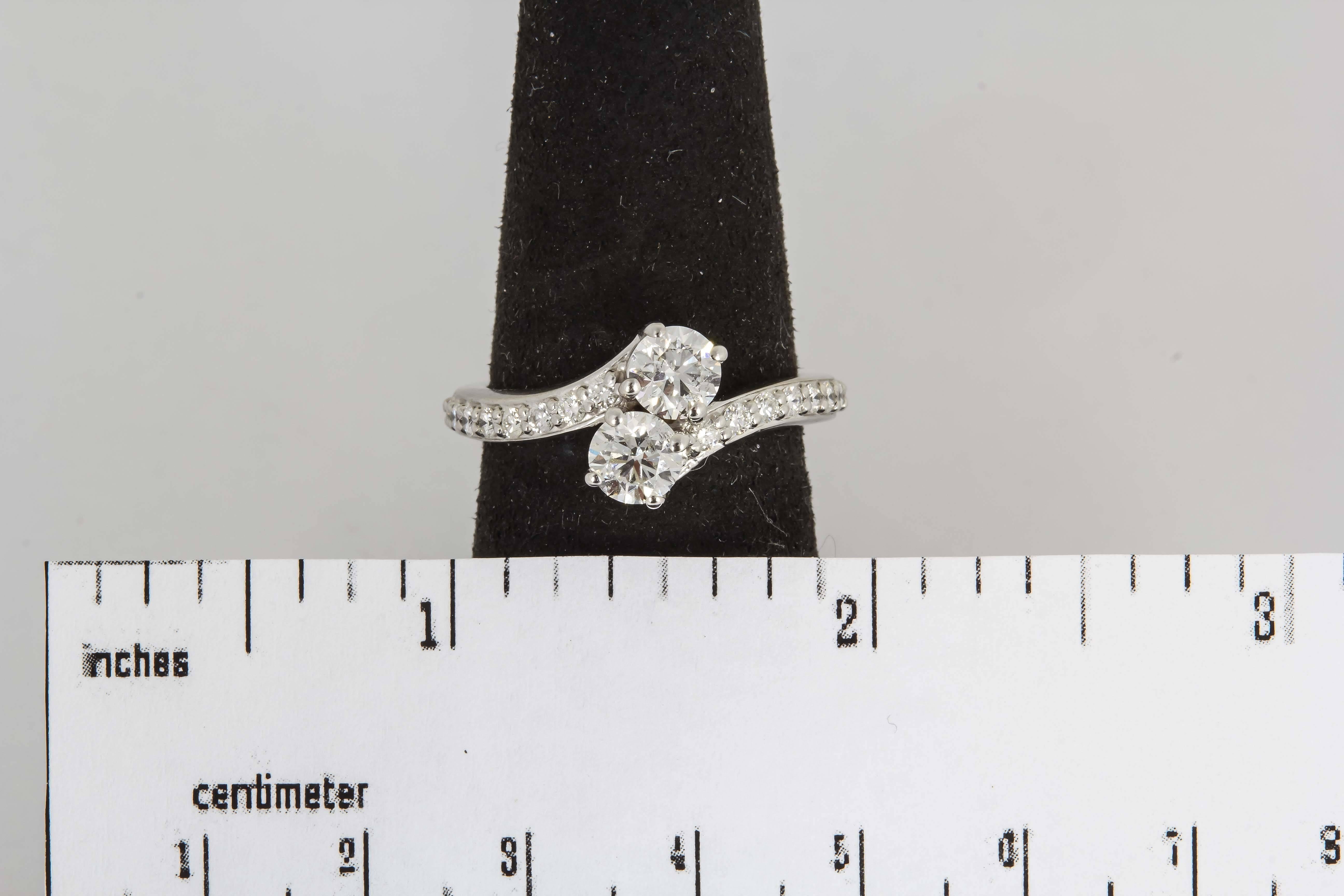 Total weight : 1.35 Cts.
Color: G
Clarity: SI1-SI2
Gold: 14k white gold
size 6.50 but can be re sized to any size free of charge.
We also custom make to any size diamonds.
all our rings come with a retail appraisal from AGI 
