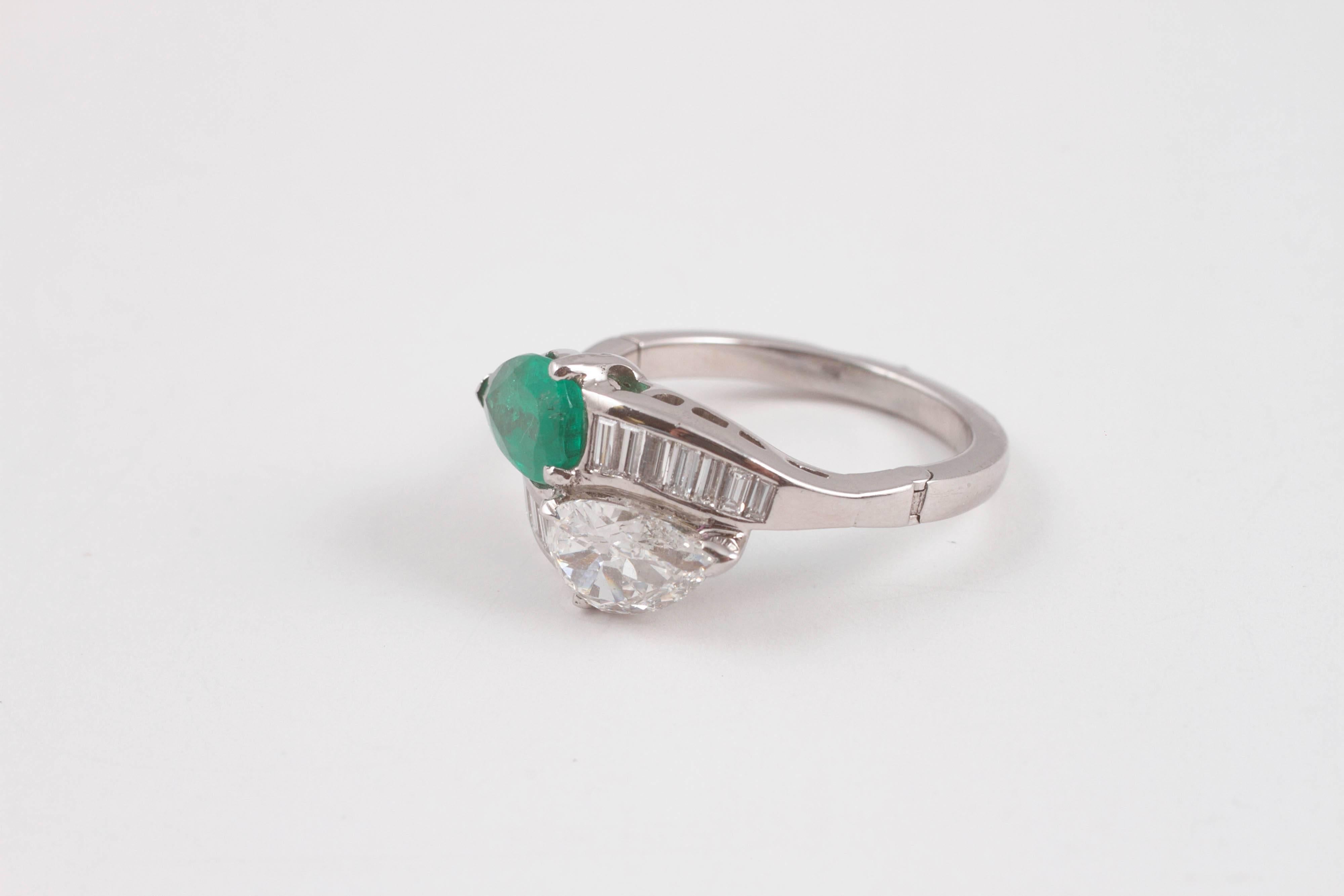 1950s 1.08 Carat Emerald 0.83 Carat Diamond Platinum Bypass Ring 3