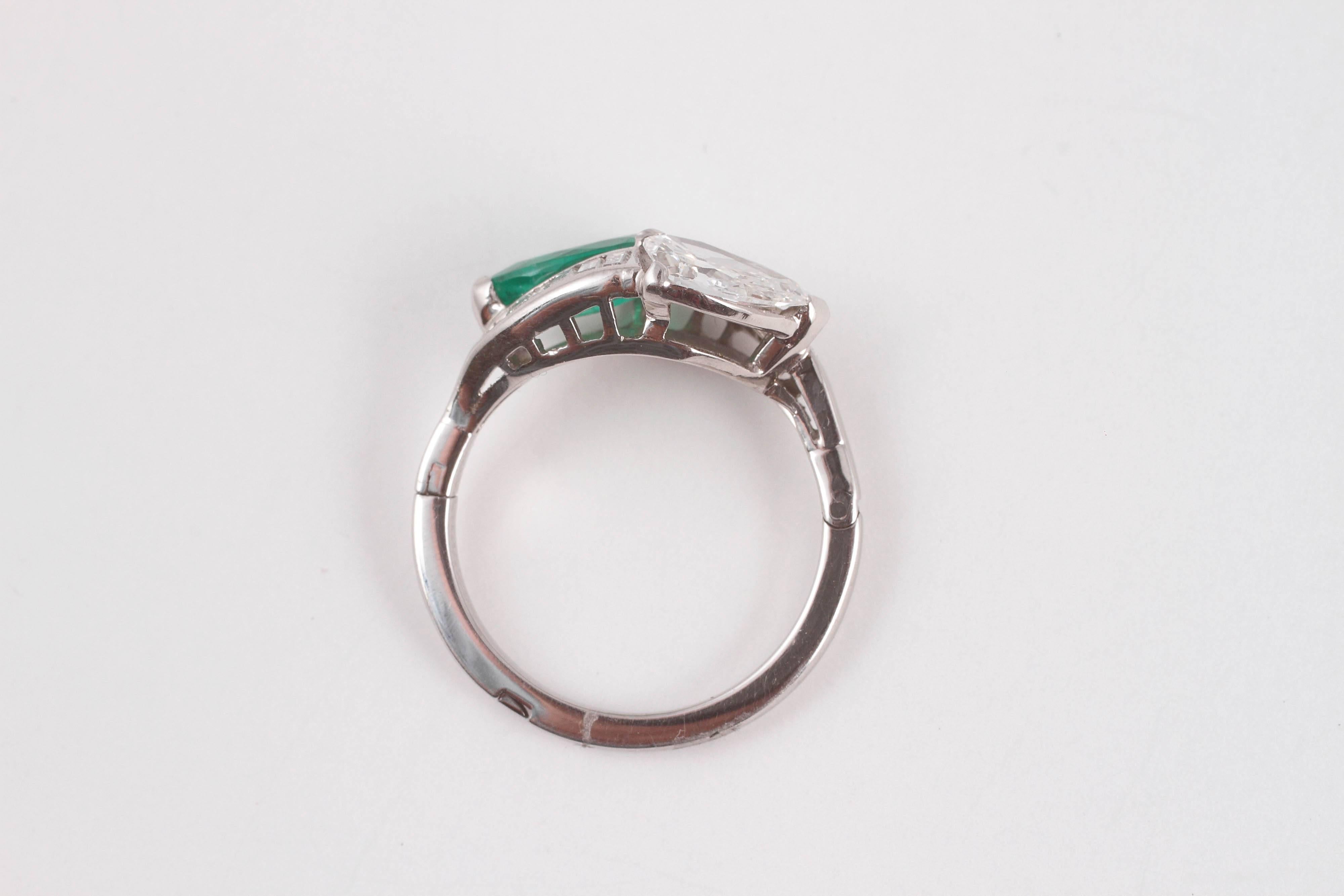 1950s 1.08 Carat Emerald 0.83 Carat Diamond Platinum Bypass Ring 4