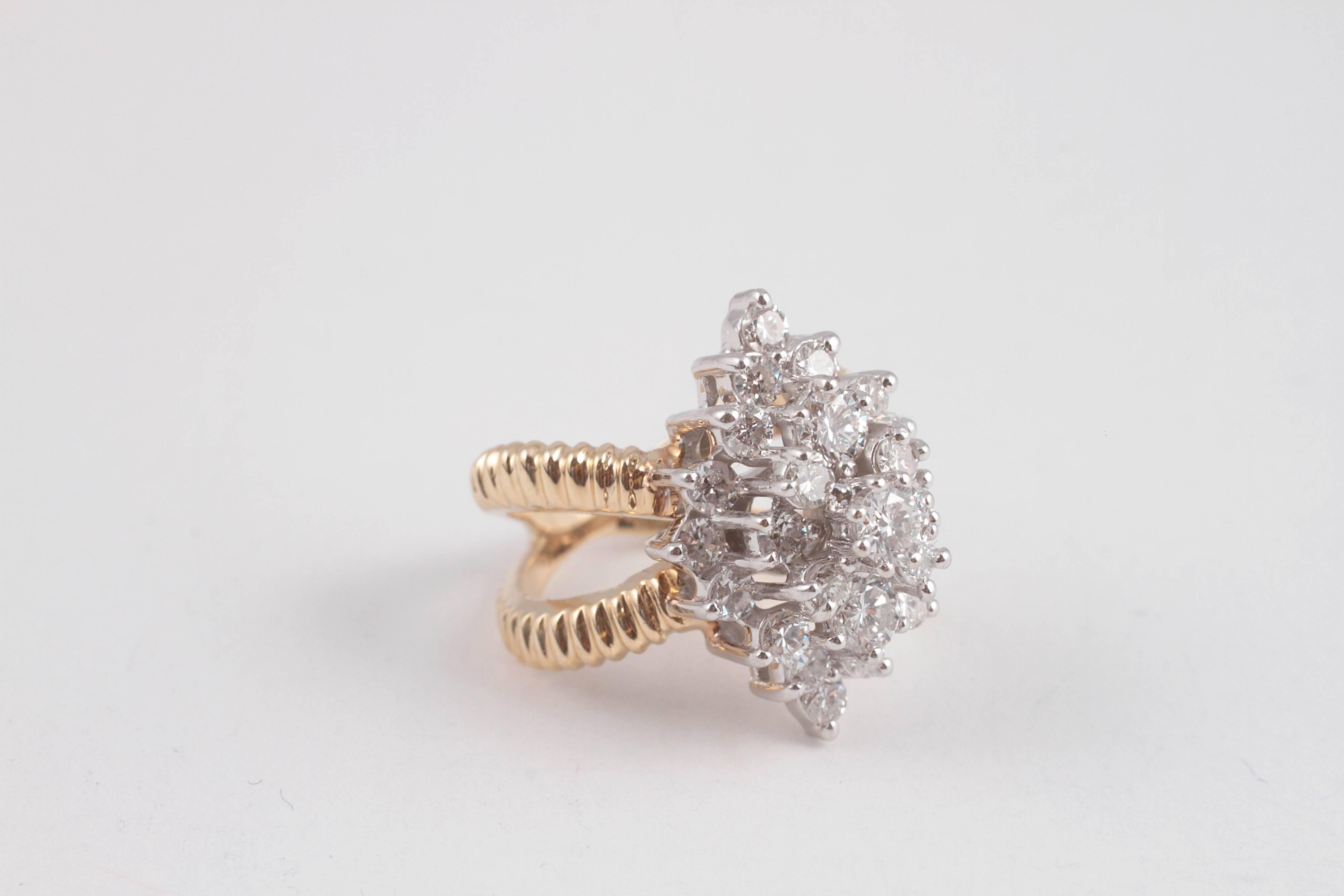 The marquise shape is back in grand style.  This cluster of diamonds in that very shape is a great vintage statement.  A standard size 6 makes it easy to slip on your finger.  Take a test drive and take it home. 