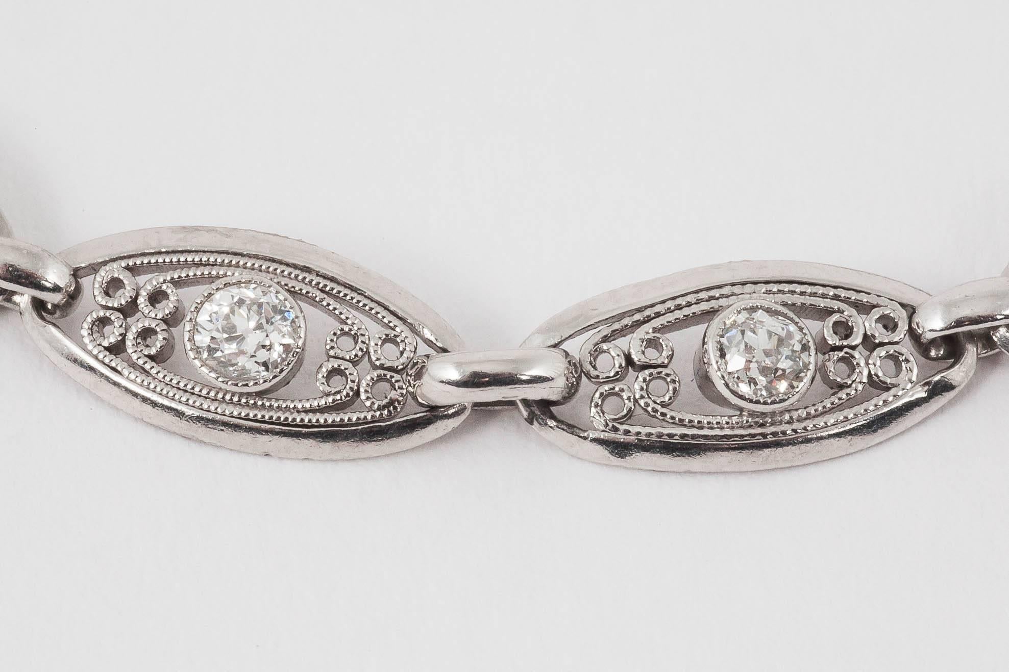Edwardian Platinum Bracelet with Openwork Links set with Diamonds, French circa 1920 For Sale