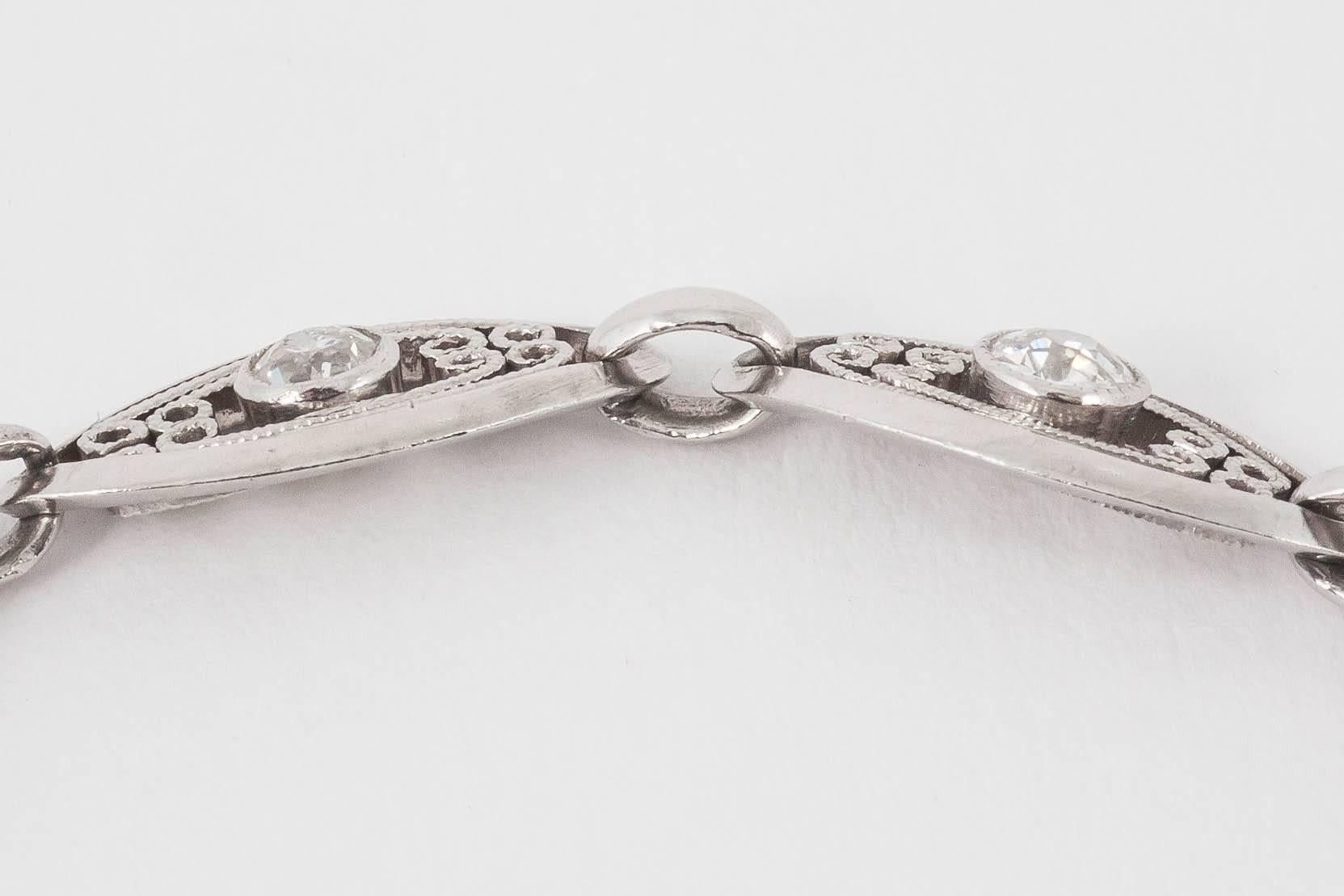 Round Cut Platinum Bracelet with Openwork Links set with Diamonds, French circa 1920 For Sale