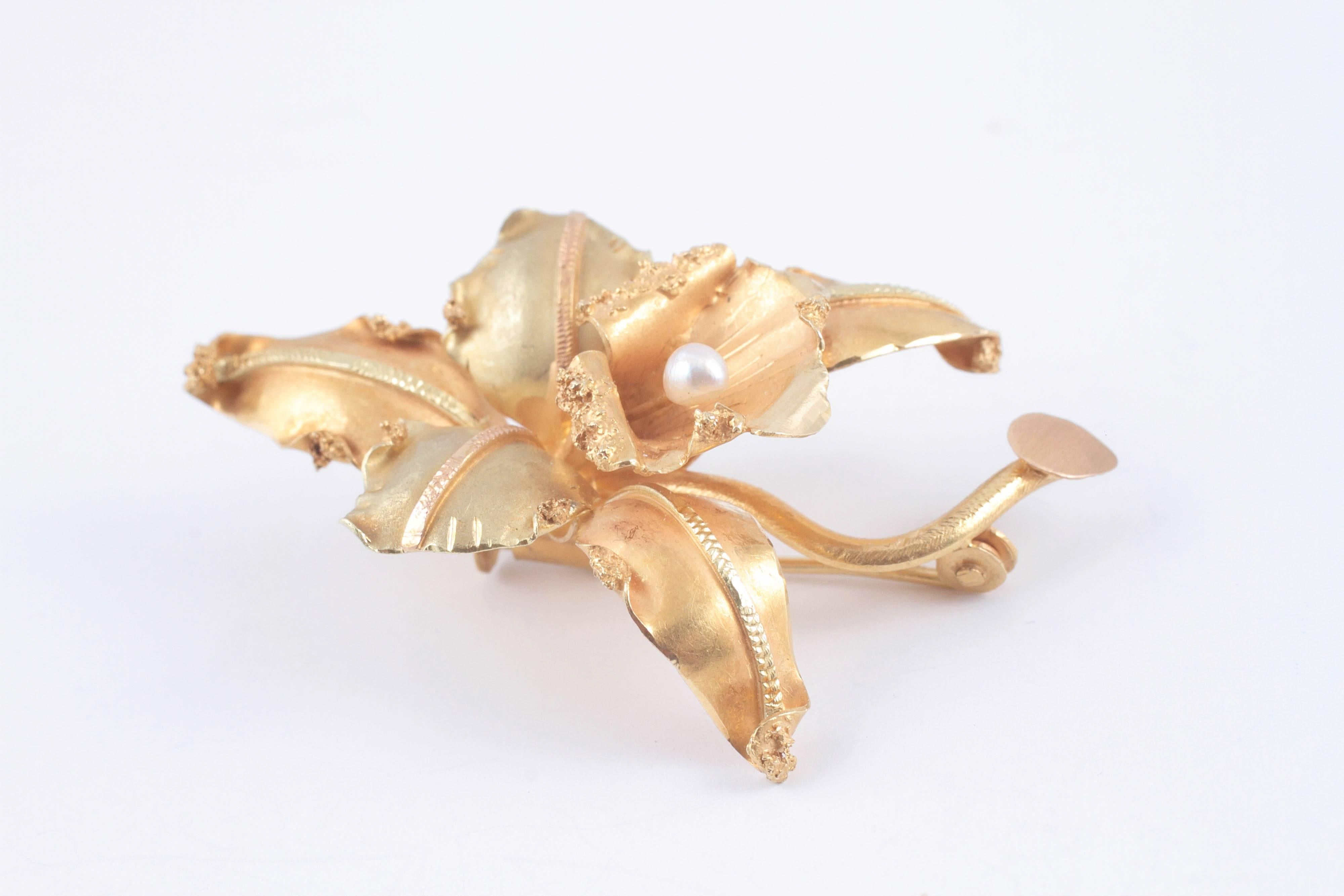 Oversized 18 karat yellow gold orchid pin, A bold and organic design for someone who likes out of the ordinary.  