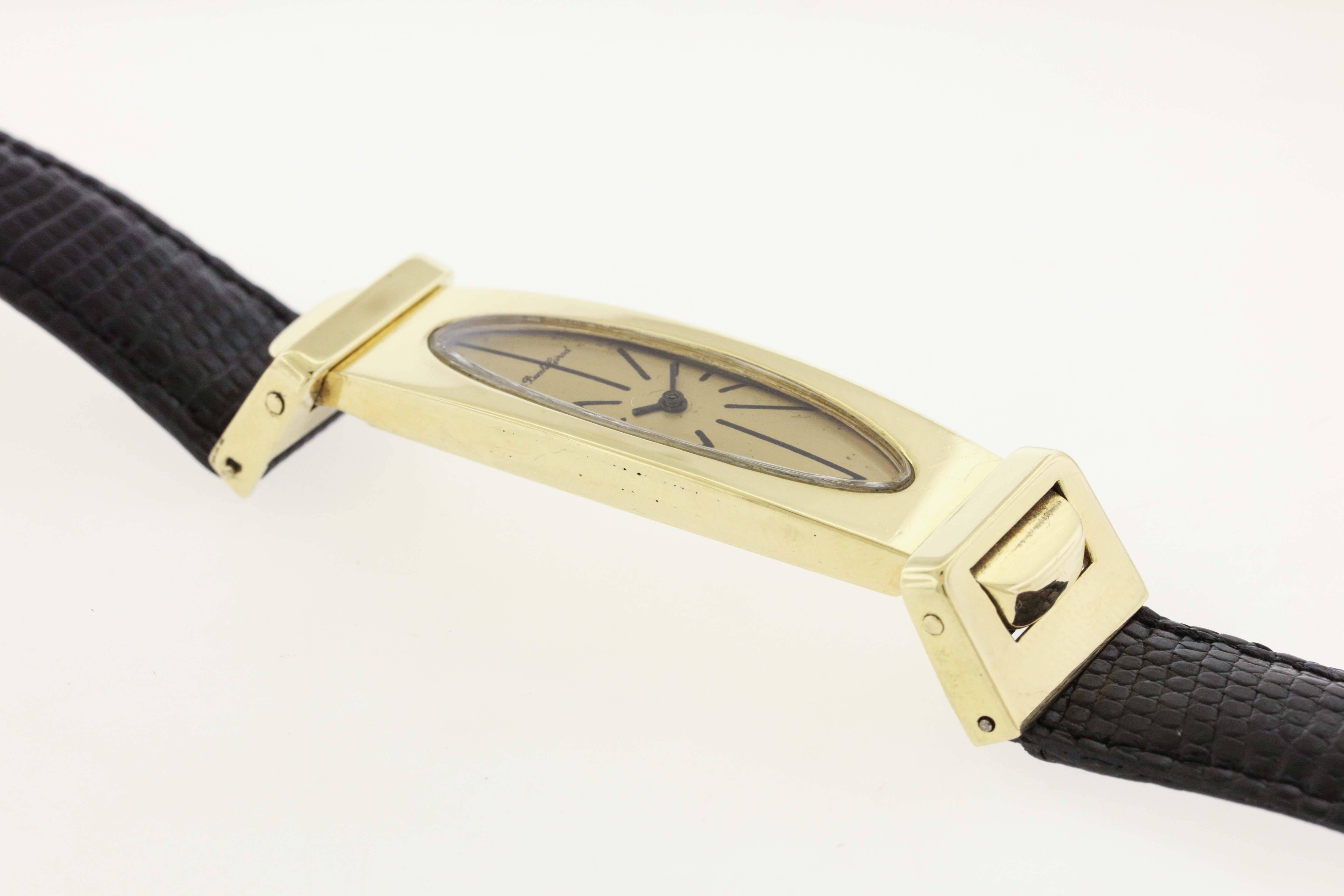 Design rules in this elongated stylized wristwatch from the 1970's from Swiss maker Bueche Girod, known for their avant-garde designs and fine watchmaking. The 18K gold case measures 16mm x 59mm (including lugs), snapback, fixed angular lugs at 120
