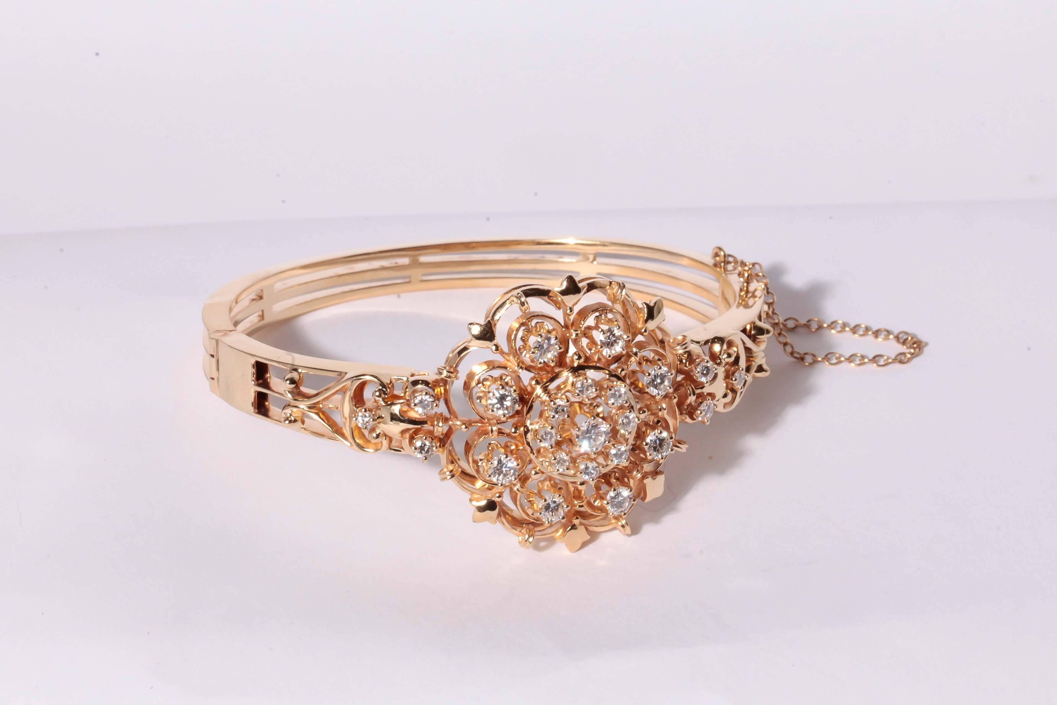 This is an approximately 1.70 ct tw. Victorian reproduction, hinged bangle bracelet.